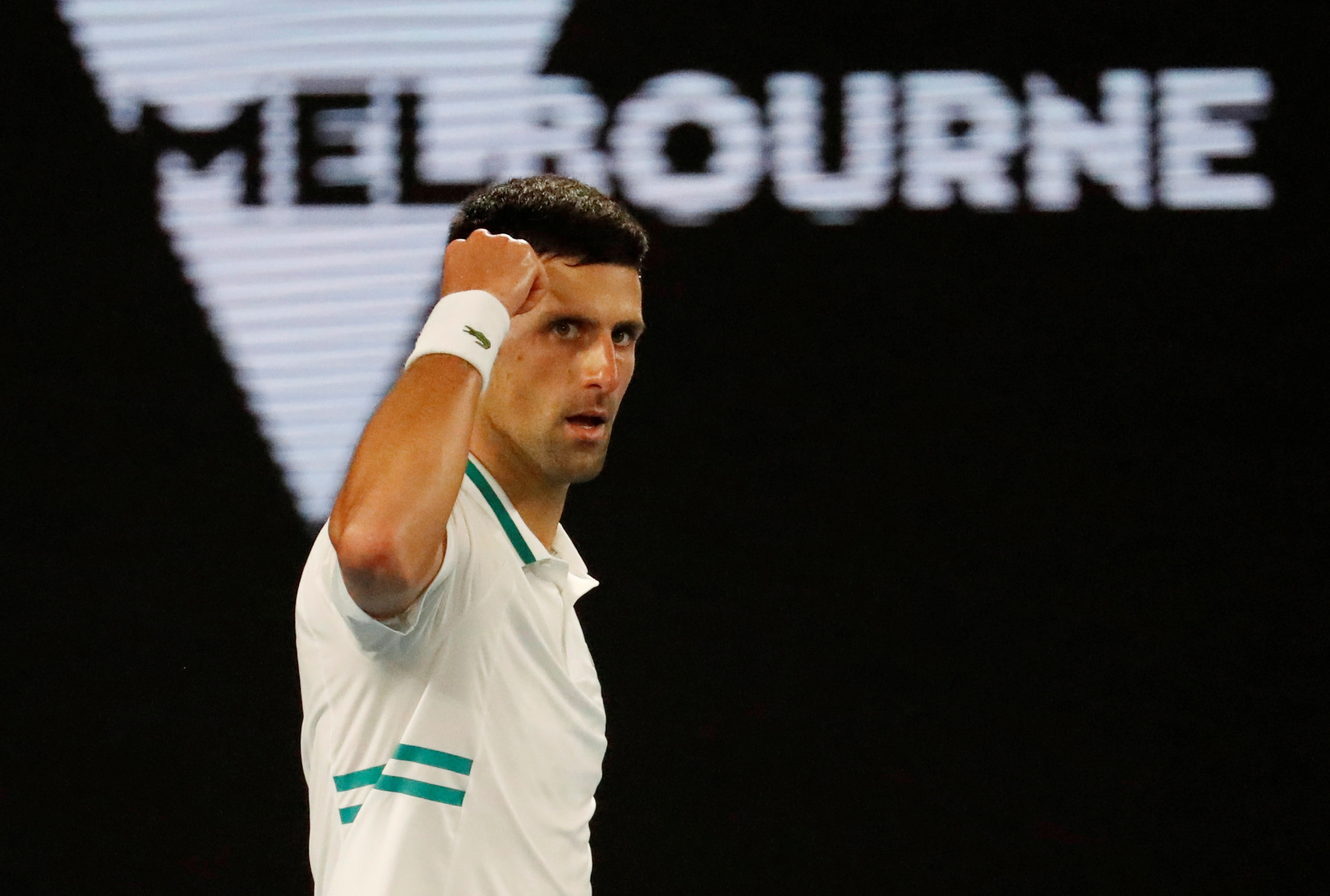 FILE PHOTO: Tennis - Australian Open - Men's Singles Final - Melbourne Park, Melbourne, Australia, February 21, 2021 Serbia's Novak Djokovic reacts during his final match against Russia's Daniil Medvedev REUTERS