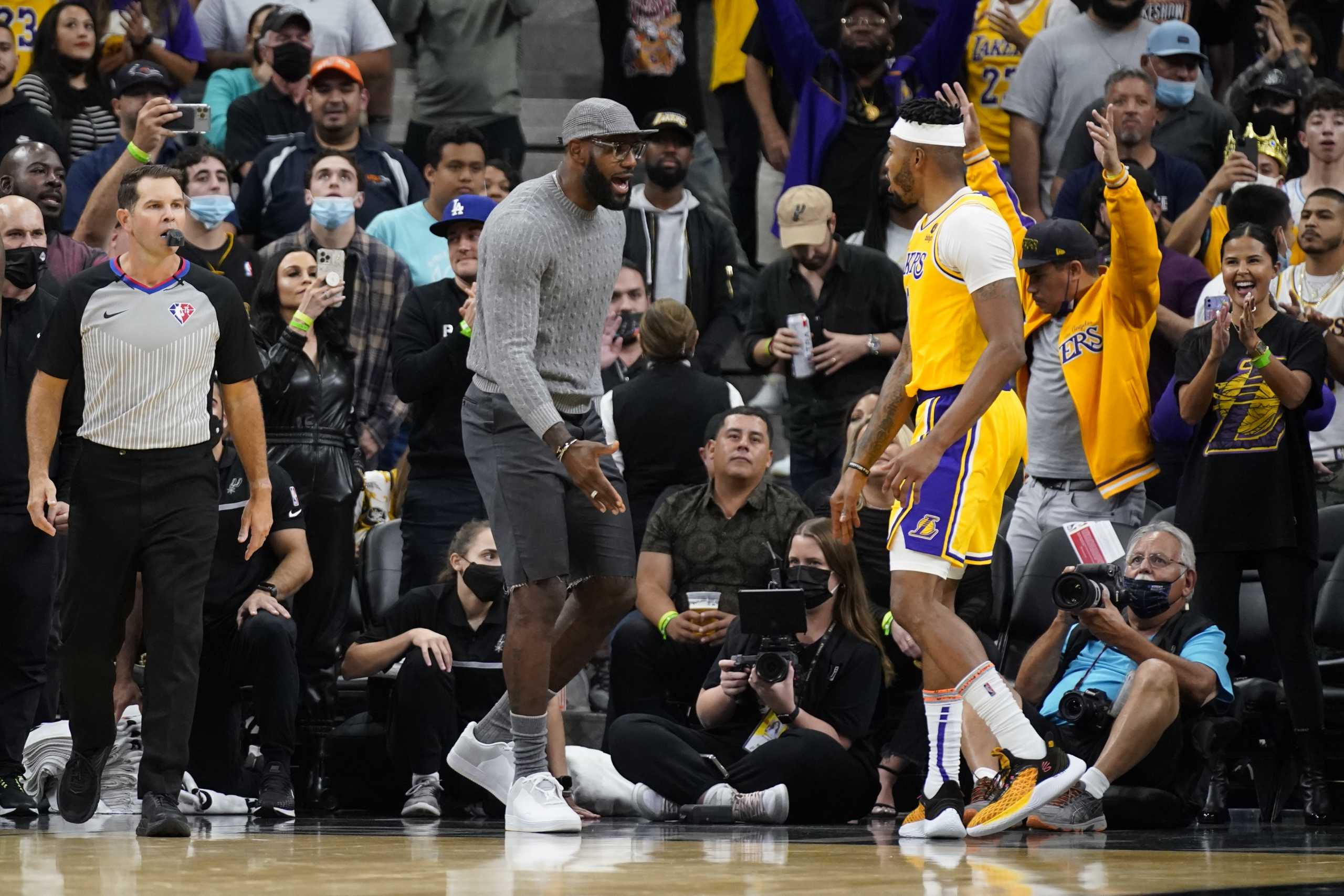 Oct 26, 2021; San Antonio, Texas, USA; Los Angeles Lakers forwards LeBron James (6) and Kent Bazemore (9) celebrate an overtime victory over the San Antonio Spurs at AT&T Center. Mandatory Credit: Scott Wachter-USA TODAY Sports