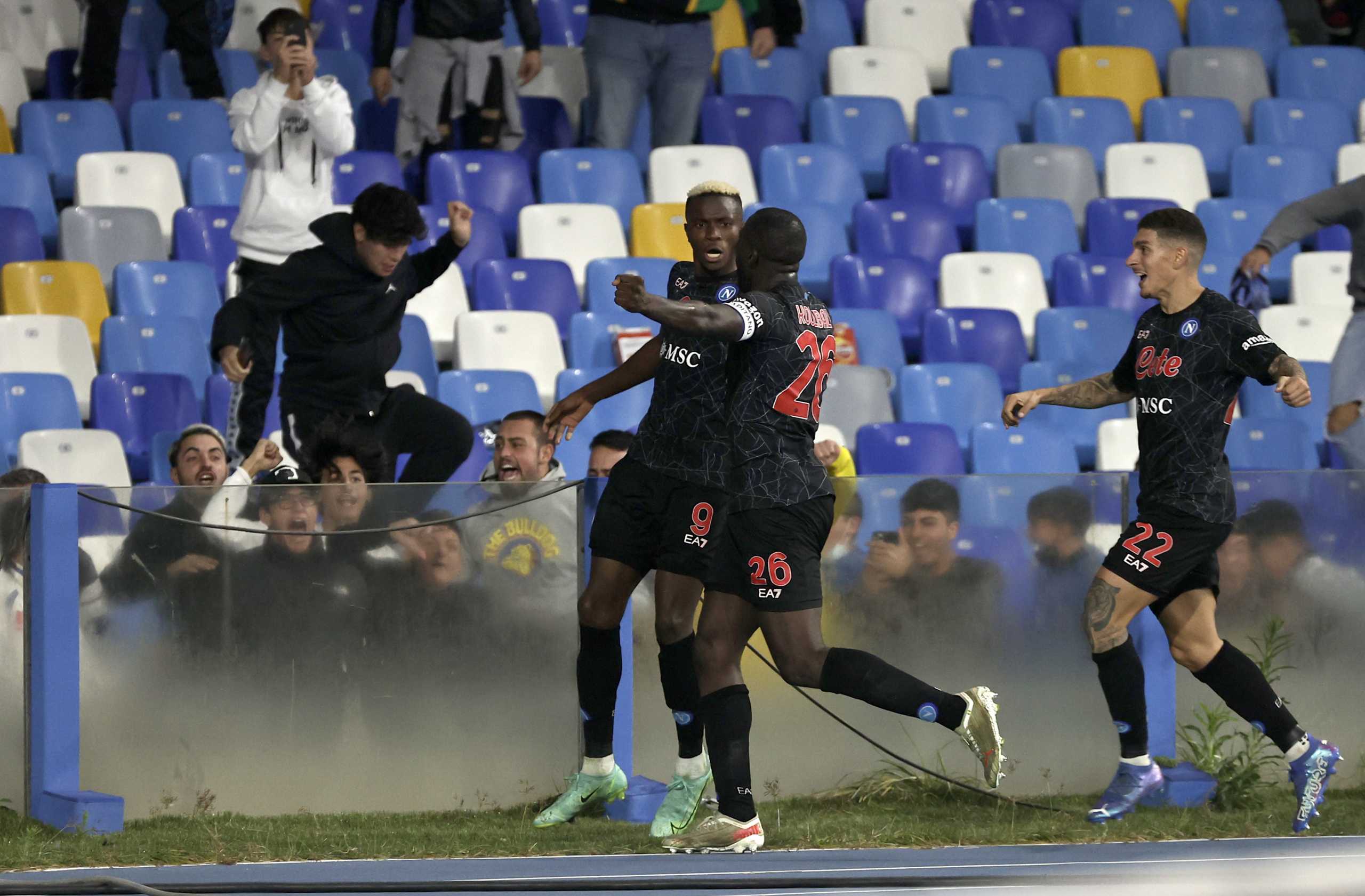 Soccer Football - Serie A - Napoli v Torino - Stadio Diego Armando Maradona, Naples, Italy - October 17, 2021  Napoli's Victor Osimhen celebrates scoring their first goal with Kalidou Koulibaly and Giovanni Di Lorenzo REUTERS