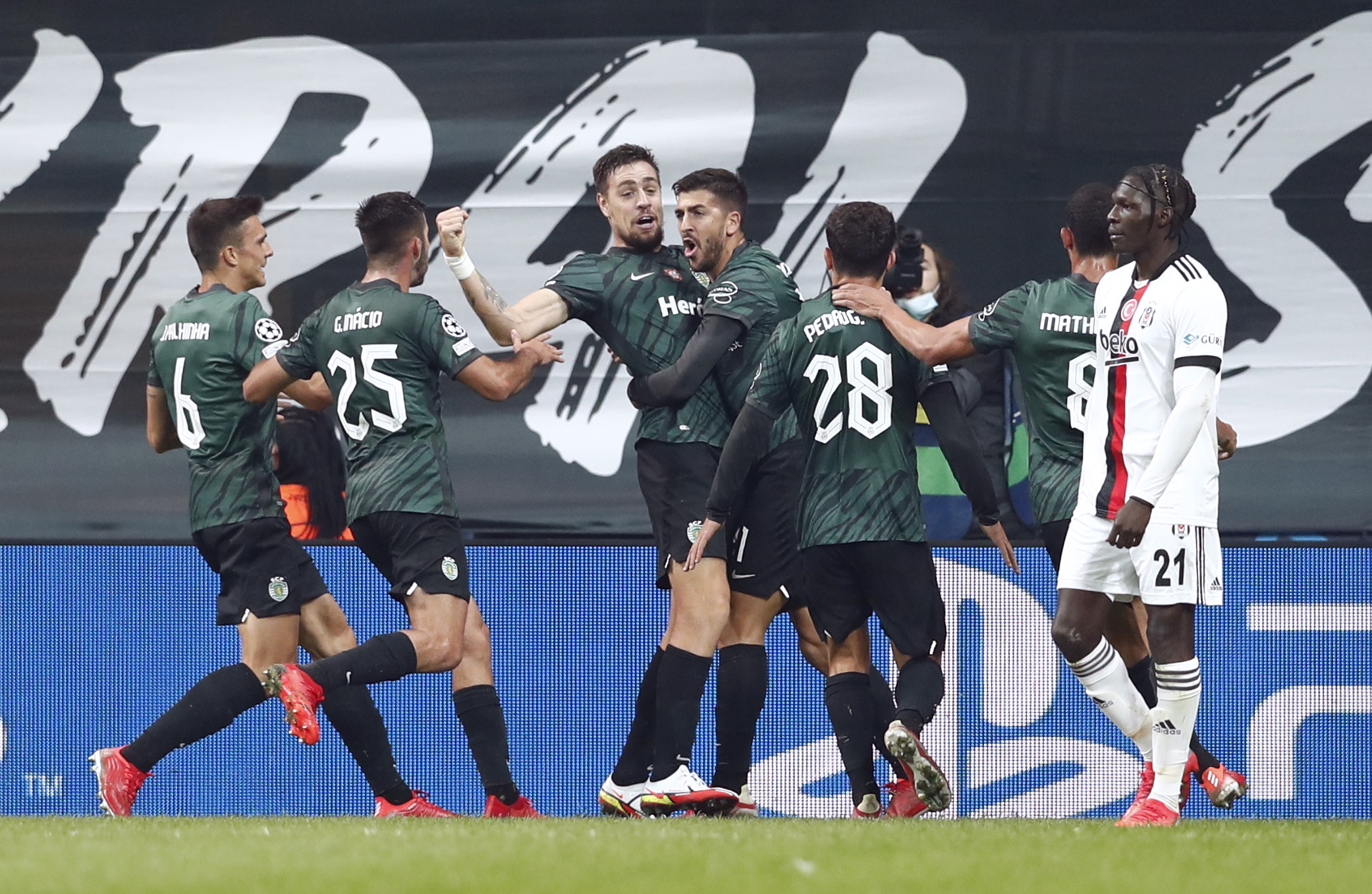 Soccer Football - Champions League - Group C - Besiktas v Sporting CP - Vodafone Park, Istanbul, Turkey - October 19, 2021 Sporting CP's Sebastian Coates celebrates scoring their second goal with teammates REUTERS
