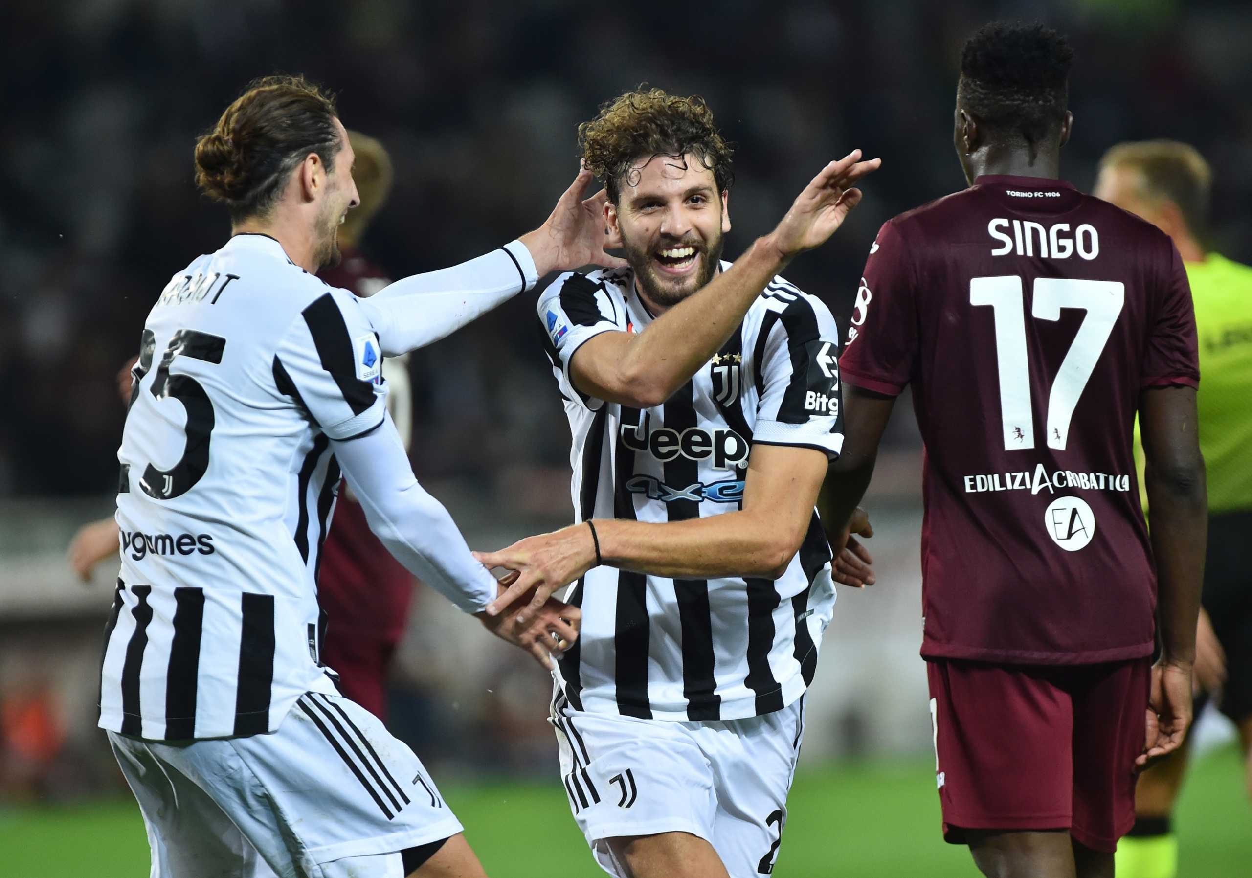 Soccer Football - Serie A - Torino v Juventus - Stadio Olimpico Grande Torino, Turin, Italy - October 2, 2021 Juventus' Manuel Locatelli celebrates scoring their first goal with Adrien Rabiot REUTERS