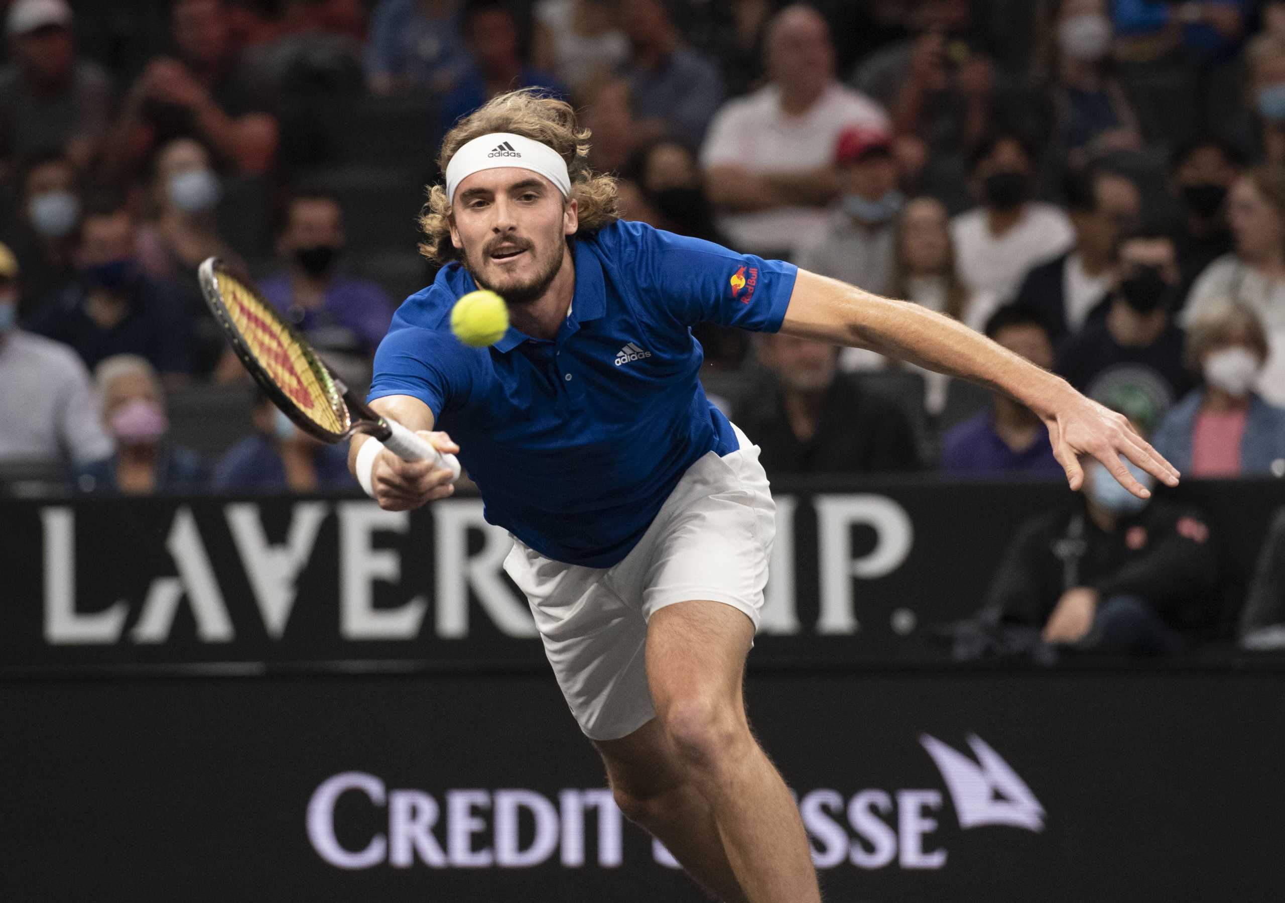 Sep 25, 2021; Boston, MA, USA;  Team Europe player Stefanos Tsitsipas reaches for  shot in the first set of his match against Team World player Nick Kyrgios at TD Garden. Mandatory Credit: Richard Cashin-USA TODAY Sports