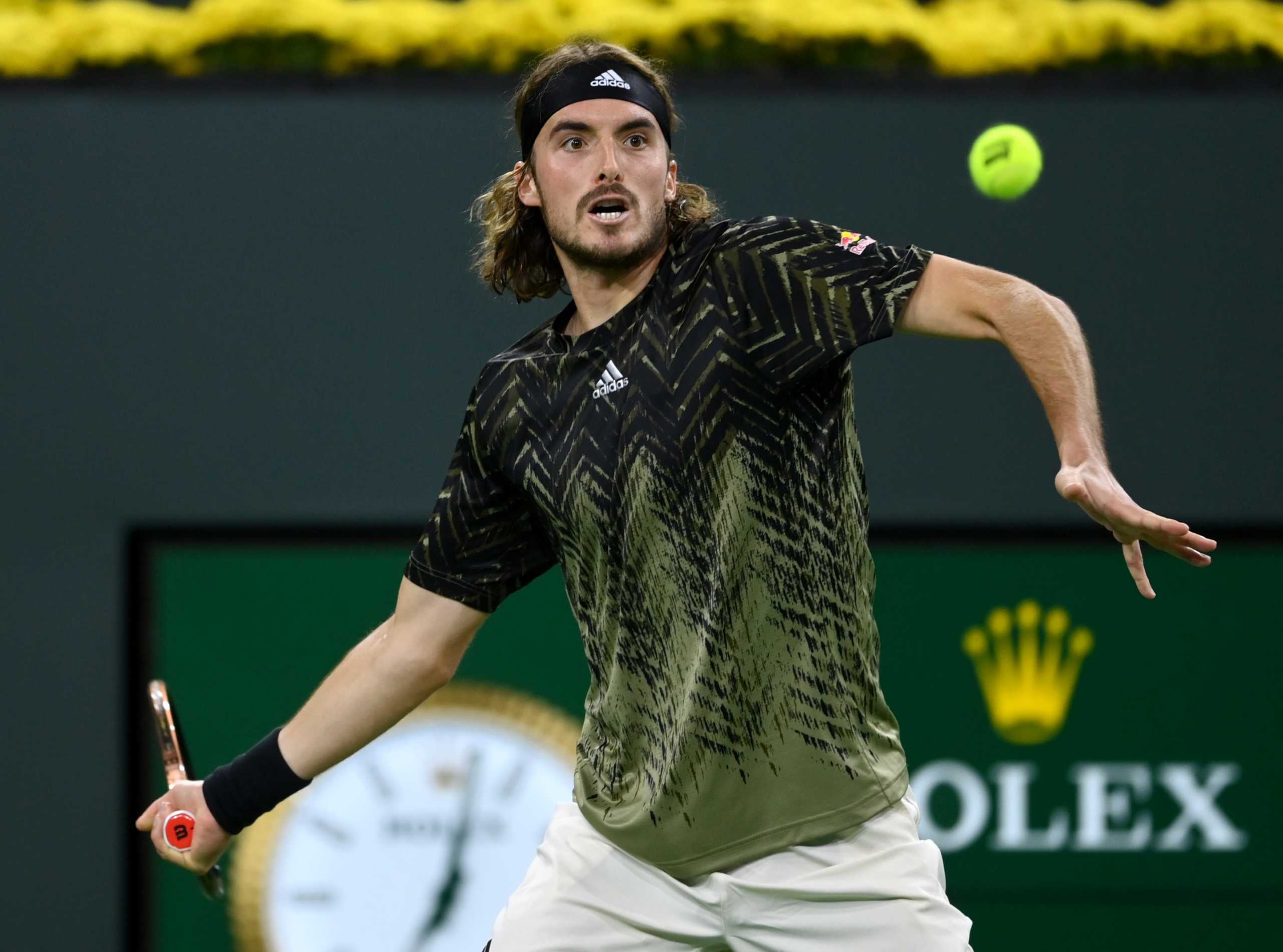 Oct 10, 2021; Indian Wells, CA, USA; Stefanos Tsitsipas (GRE) hits a shot in his third round match against Pedro Martinez (ESP) during the BNP Paribas Open at the Indian Wells Tennis Garden. Mandatory Credit: Jayne Kamin-Oncea-USA TODAY Sports