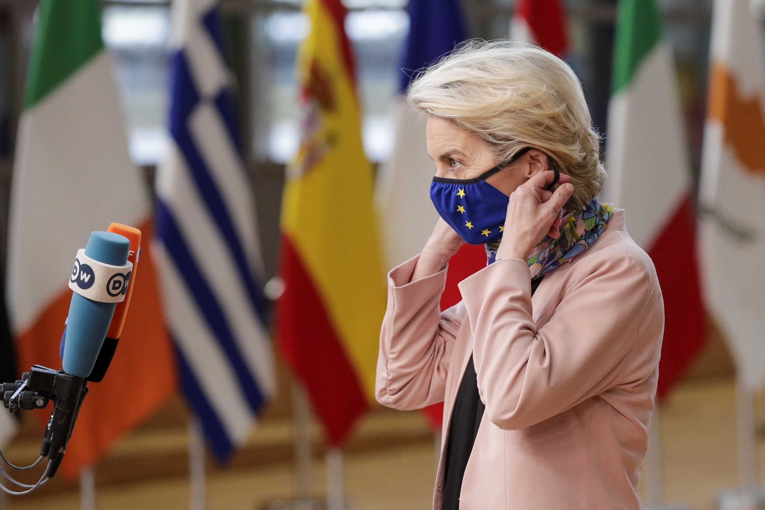 European Commission President Ursula von der Leyen adjusts her protective face mask as she arrives for an EU leaders summit in Brussels, Belgium, October 21, 2021. Olivier Hoslet