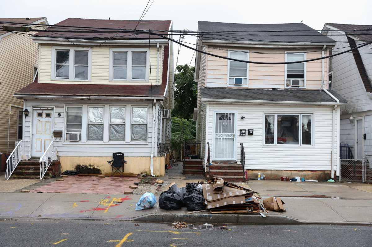 Damage from flooding during the aftermath of Hurricane Ida is still being cleaned up in Queens, during a Nor?easter in New York, U.S., October 26, 2021. REUTERS