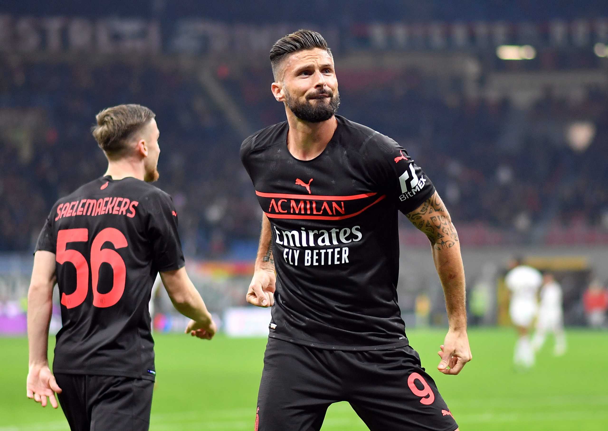 Soccer Football - Serie A - AC Milan v Torino - San Siro, Milan, Italy - October 26, 2021 AC Milan's Olivier Giroud celebrates scoring their first goal REUTERS