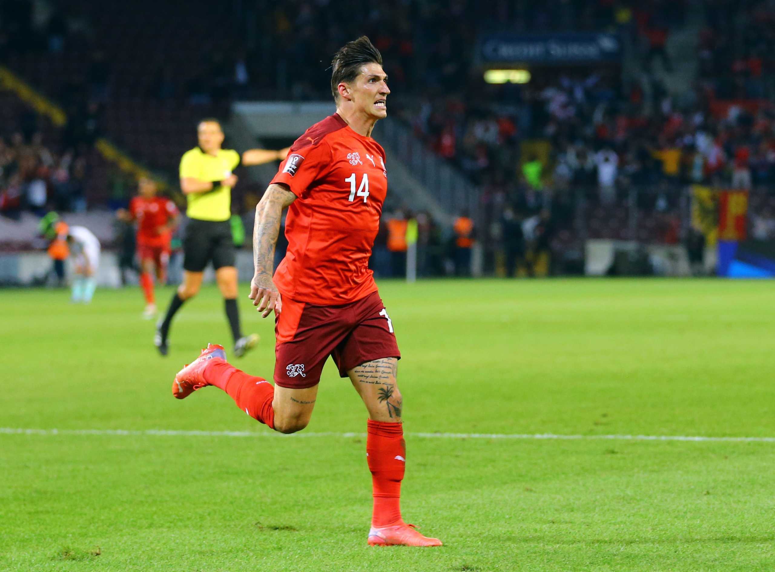 Soccer Football - World Cup - UEFA Qualifiers - Group C - Switzerland v Northern Ireland - Stade de Geneve, Lancy, Switzerland - October 9, 2021 Switzerland's Steven Zuber celebrates scoring their first goal REUTERS