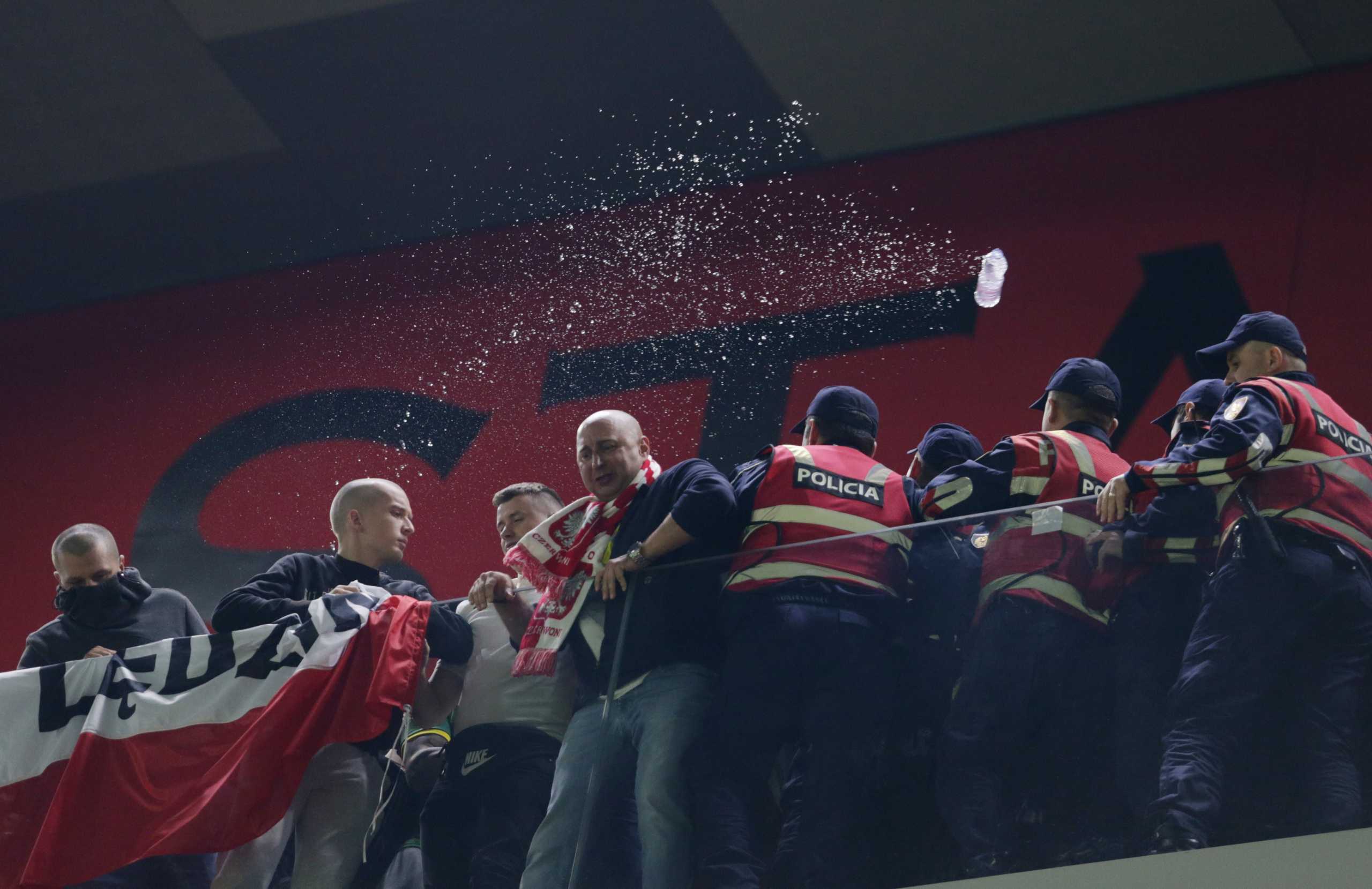 Soccer Football - World Cup - UEFA Qualifiers - Group I - Albania v Poland - Arena Kombetare, Tirana, Albania - October 12, 2021 Albania fans fans clash with Police during the match REUTERS