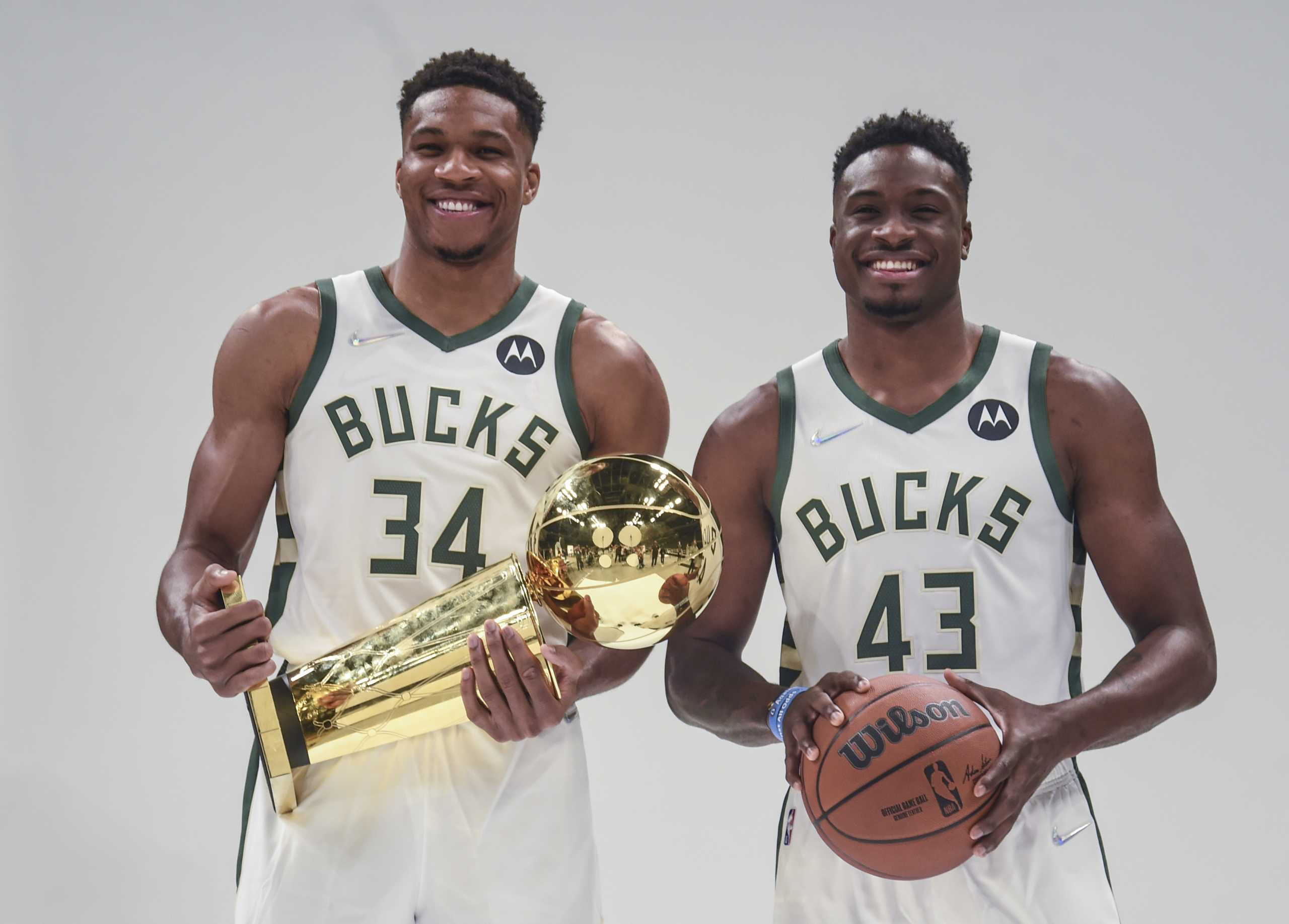Sep 27, 2021; Milwaukee, WI, USA;  Milwaukee Bucks forward Giannis Antetokounmpo (34) and forward Thanasis Antetokounmpo (43) pose for pictures during Media Day at the Fiserv Forum.  Mandatory Credit: Benny Sieu-USA TODAY Sports