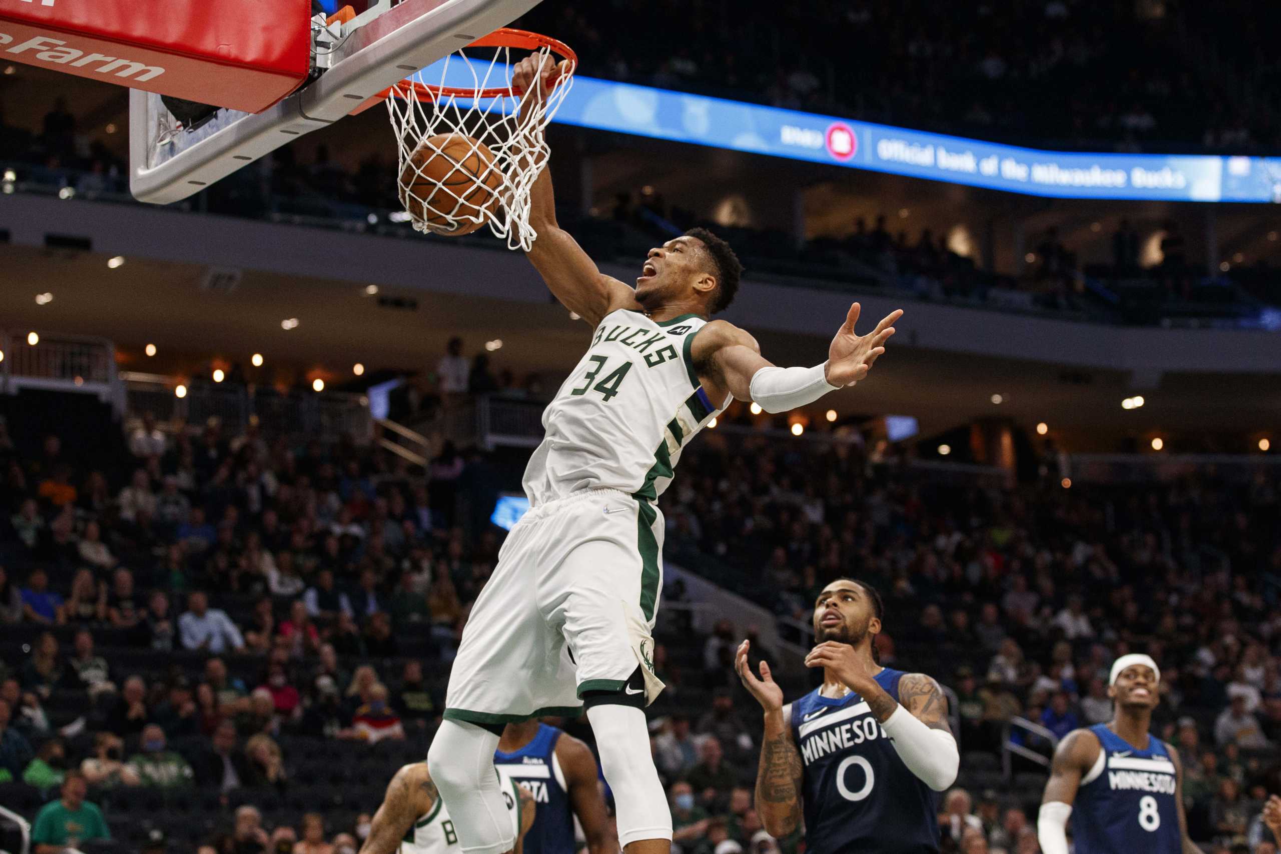 Oct 27, 2021; Milwaukee, Wisconsin, USA;  Milwaukee Bucks forward Giannis Antetokounmpo (34) dunks during the fourth quarter against the Minnesota Timberwolves at Fiserv Forum. Mandatory Credit: Jeff Hanisch-USA TODAY Sports