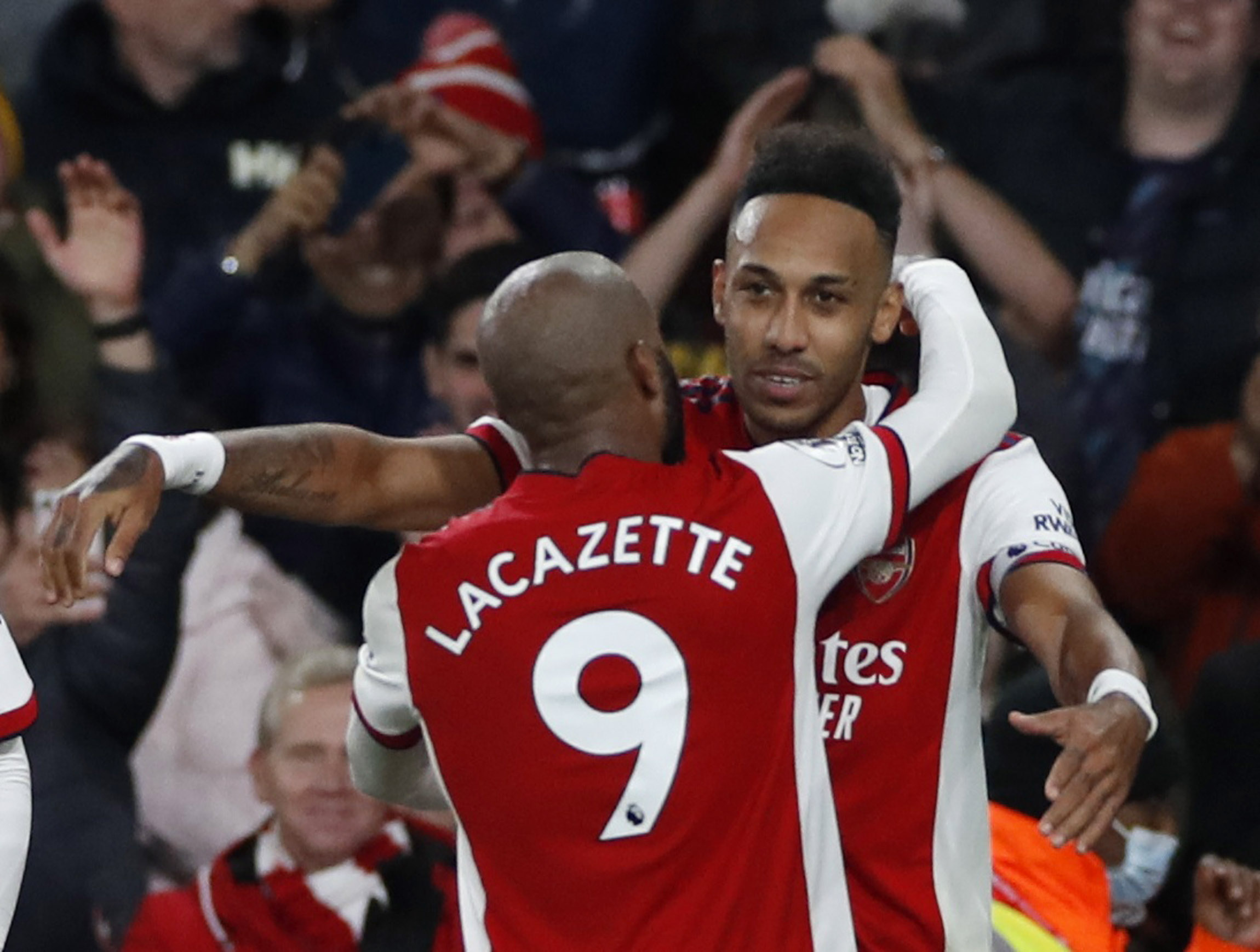 Soccer Football - Premier League - Arsenal v Aston Villa - Emirates Stadium, London, Britain - October 22, 2021 Arsenal's Pierre-Emerick Aubameyang celebrates scoring their second goal with Alexandre Lacazette Action Images via Reuters