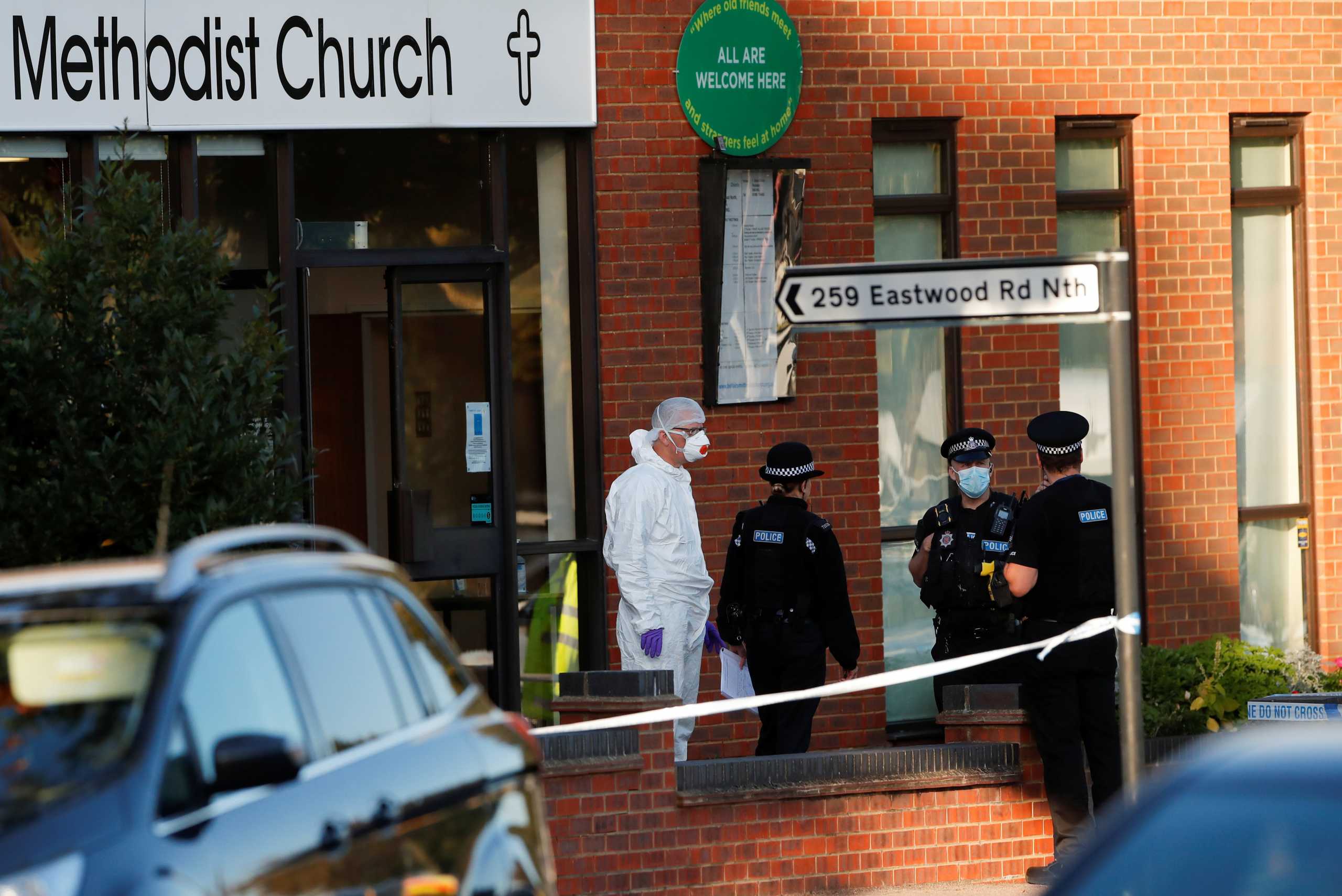 A member of the scientific police and police officers are seen at the scene where MP David Amess was stabbed during constituency surgery, in Leigh-on-Sea, Britain October 15, 2021. REUTERS