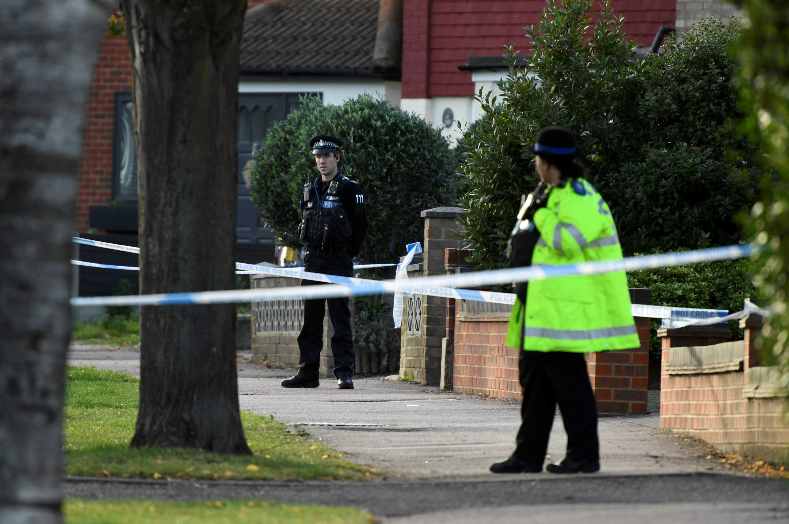 Police officers guard the scene where MP David Amess was stabbed during constituency surgery, in Leigh-on-Sea, Britain October 15, 2021. REUTERS