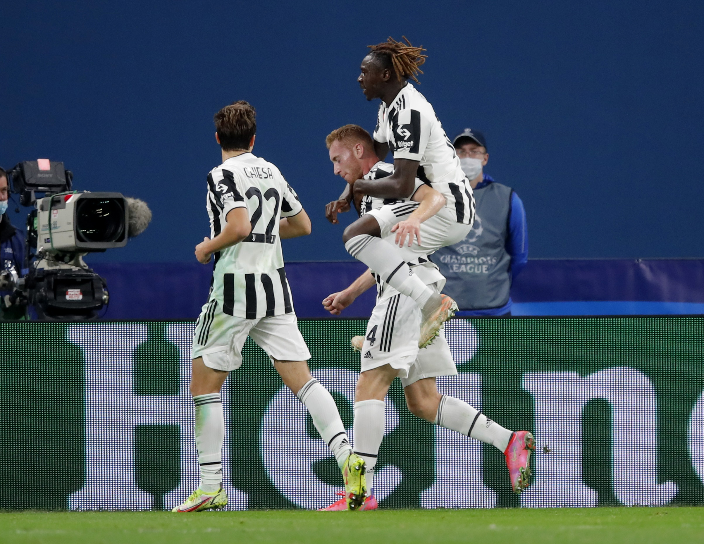 Soccer Football - Champions League - Group H - Zenit Saint Petersburg v Juventus - Gazprom Arena, Saint Petersburg, Russia - October 20, 2021  Juventus' Dejan Kulusevski celebrates scoring their first goal with Moise Kean and Federico Chiesa REUTERS