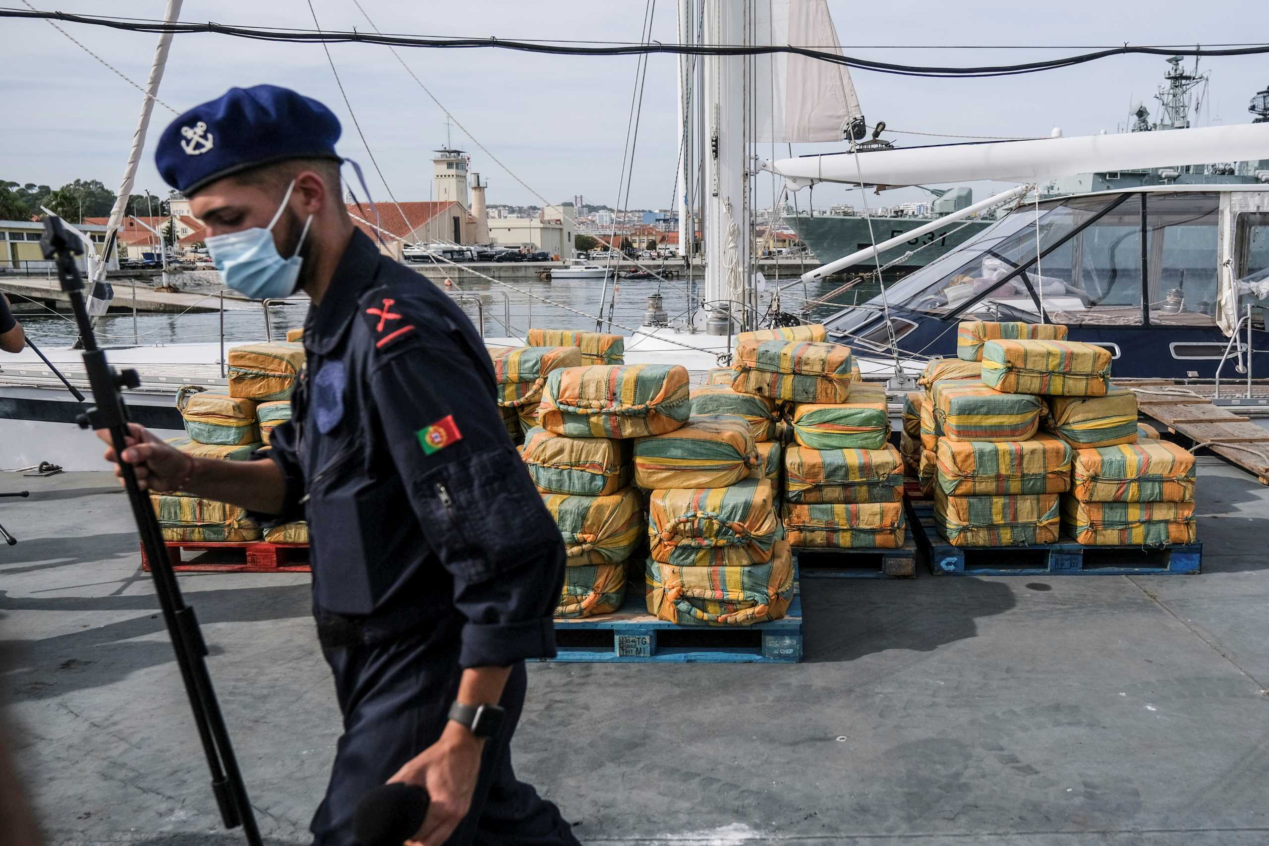 Portuguese and Spanish police attend a news conference presenting the 5.2 tons of cocaine seized in the Atlantic Ocean, in Almada, Portugal, October 18, 2021. REUTERS