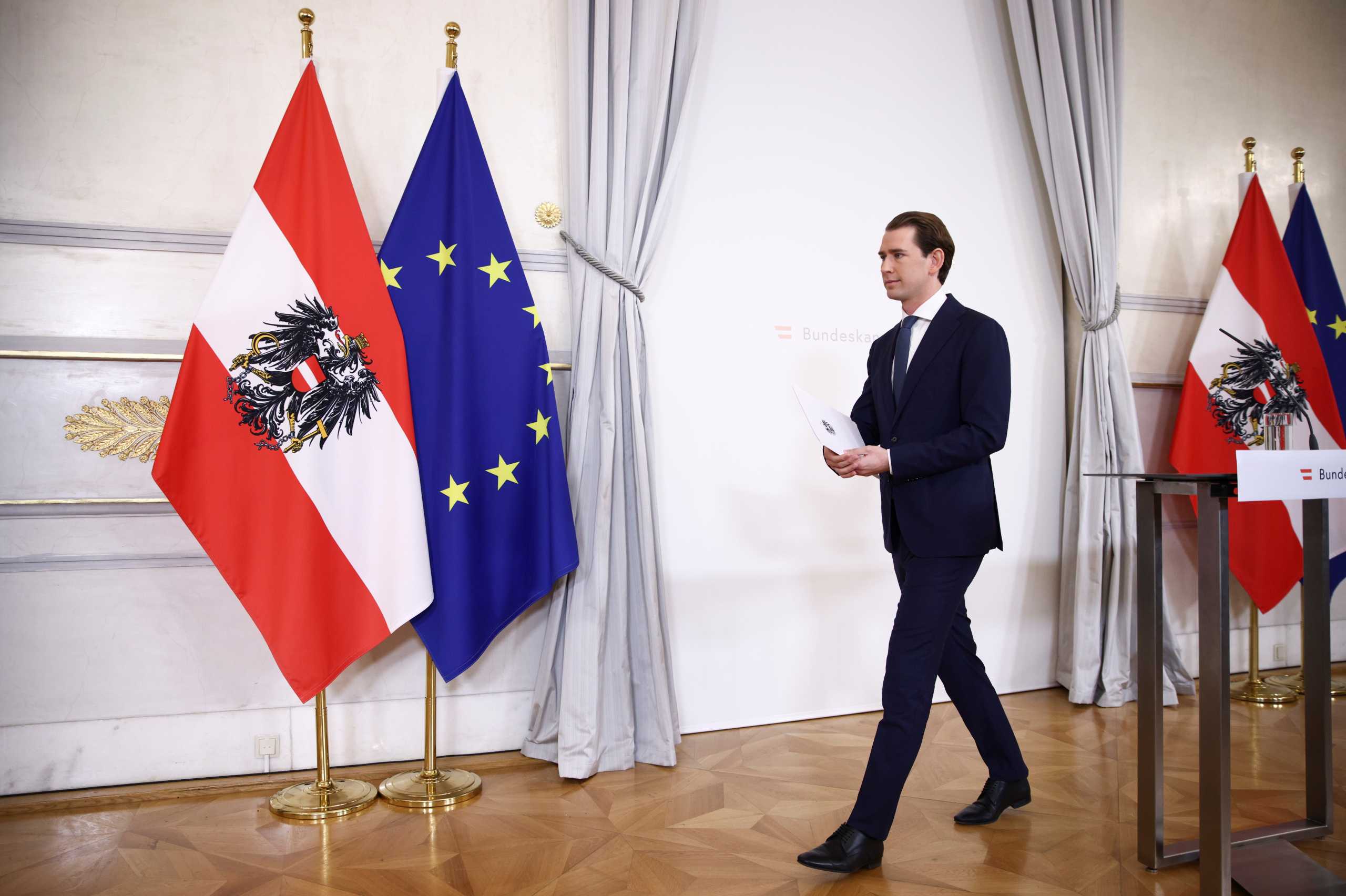 Austria's Chancellor Sebastian Kurz, who is under investigation on suspicion of corruption offences, leaves after giving a statement at the federal chancellery in Vienna, Austria October 9, 2021. REUTERS