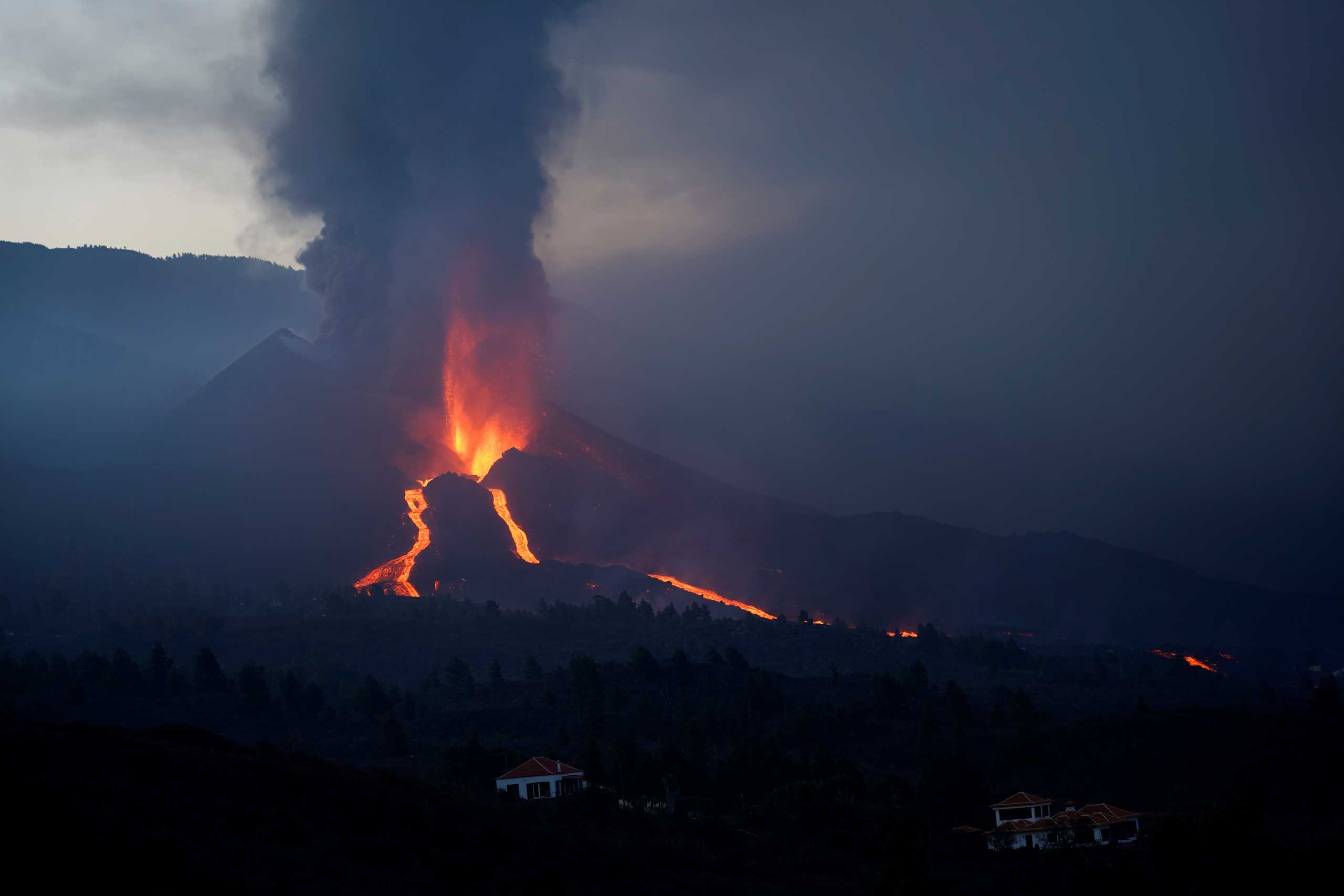 The Cumbre Vieja volcano continues to erupt on the Canary Island of La Palma, as seen from Tacande, Spain, October 9, 2021. REUTERS