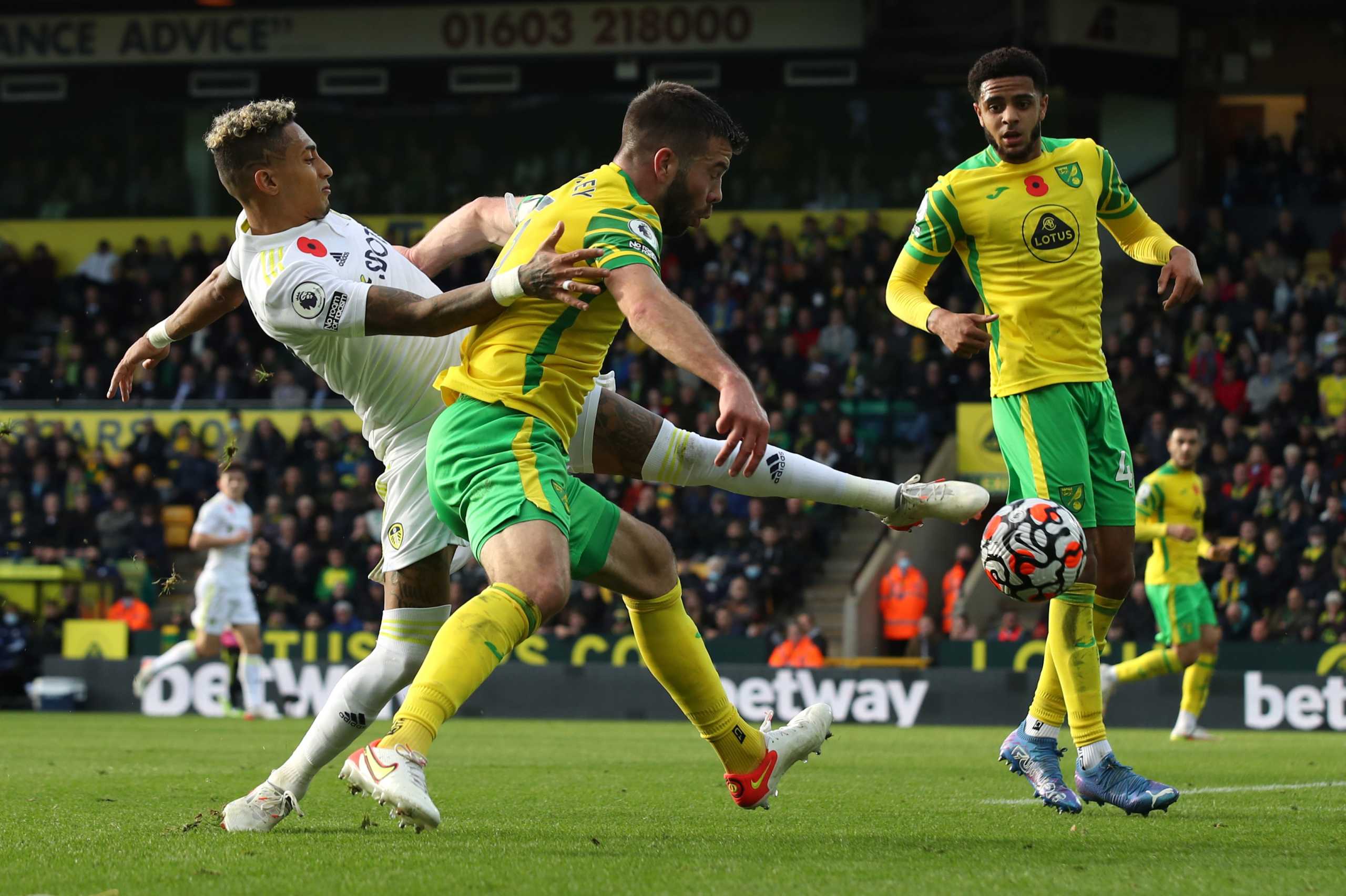 Soccer Football - Premier League - Norwich City v Leeds United - Carrow Road, Norwich, Britain - October 31, 2021 Leeds United's Raphinha in action with Norwich City's Grant Hanley REUTERS