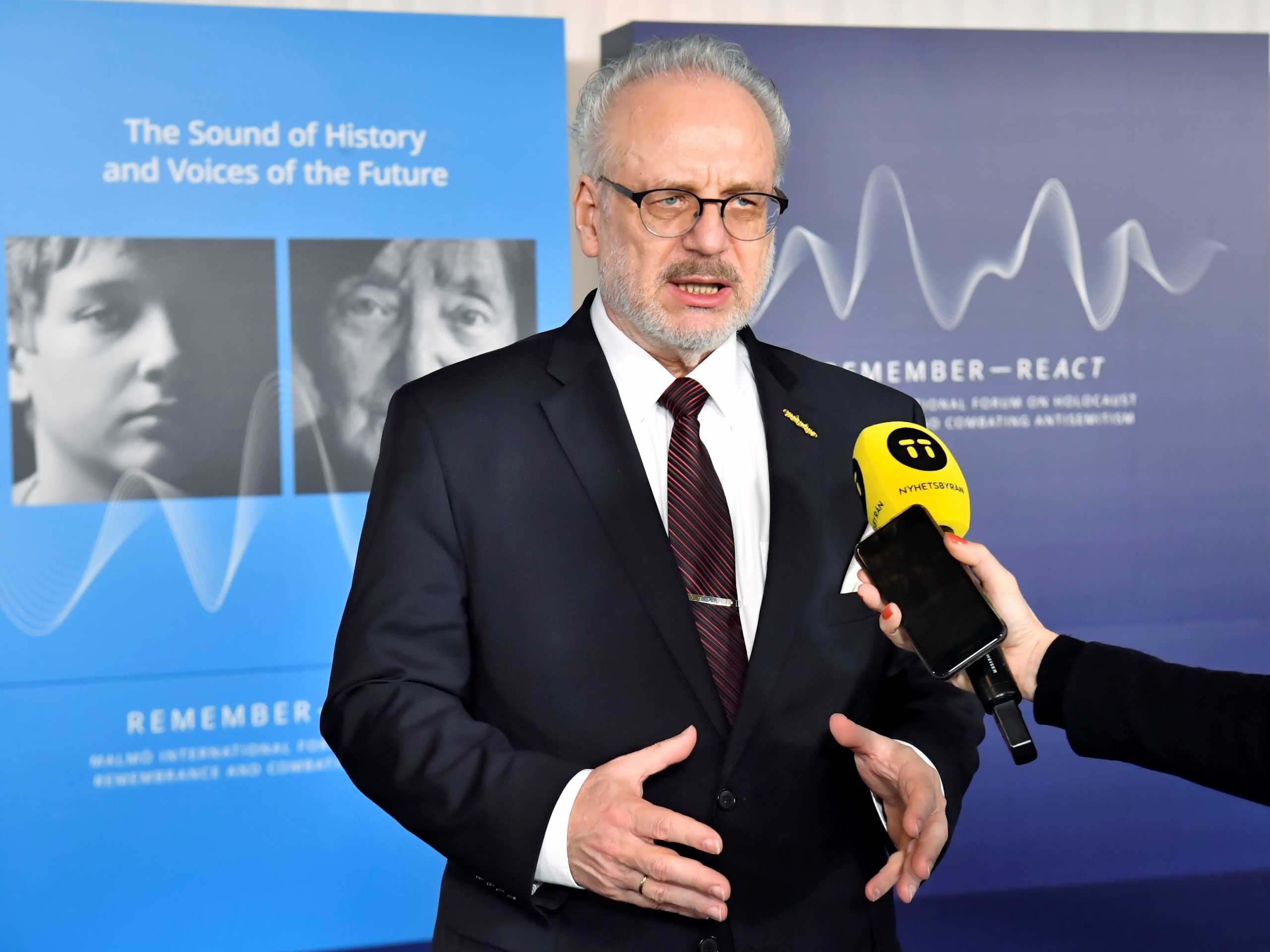 Latvia's President Egils Levits speaks to members of the media at the Malmo International Forum on Holocaust Remembrance and Combating Antisemitism in Malmo, Sweden, October 13, 2021. Jonas Ekstromer