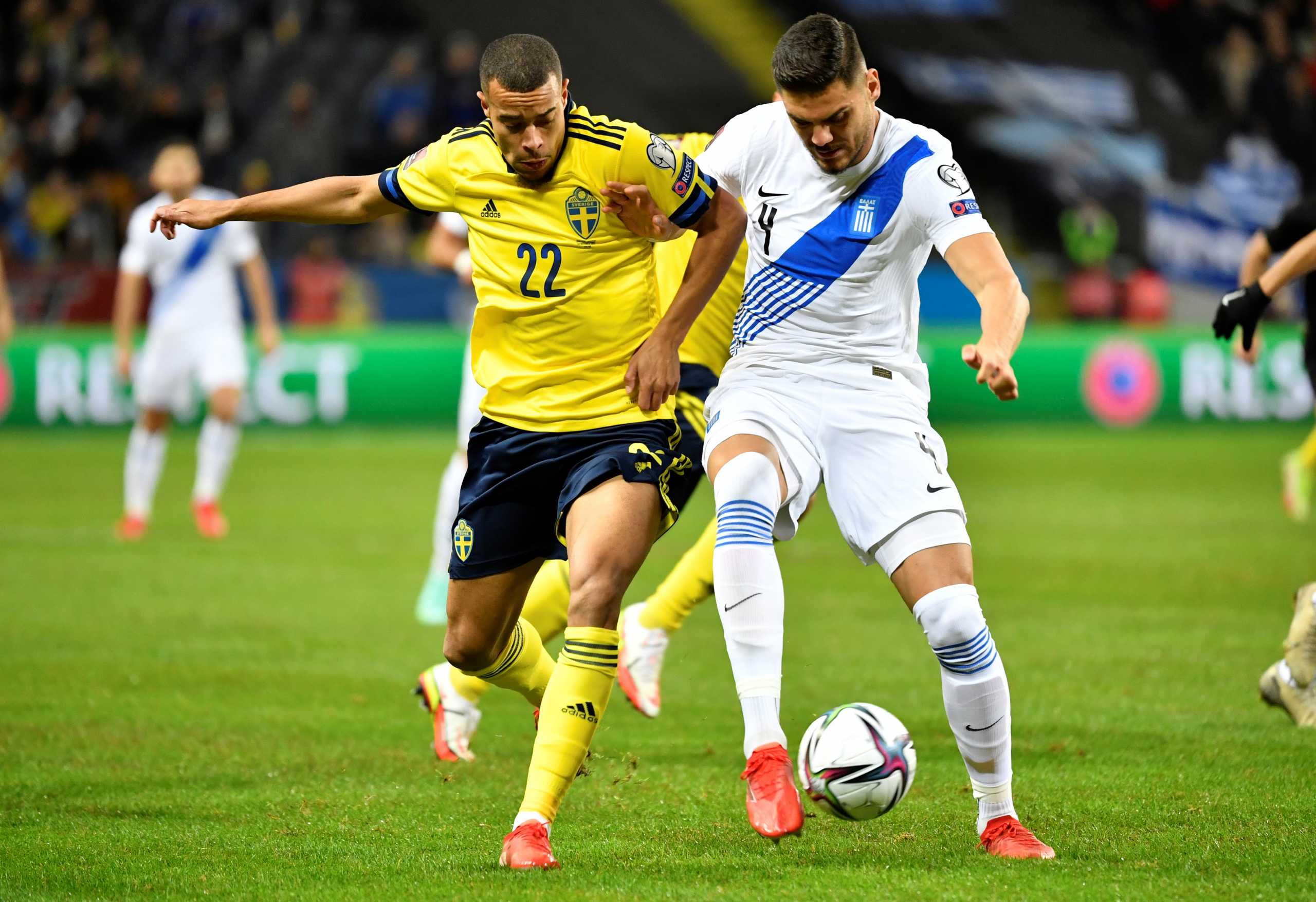 Soccer Football -  World Cup - UEFA Qualifiers - Group B - Sweden v Greece - Friends Arena, Stockholm, Sweden - October 12, 2021 Sweden's Robin Quaison in action with Greece's Kostas Mavropanos Jessica Gow