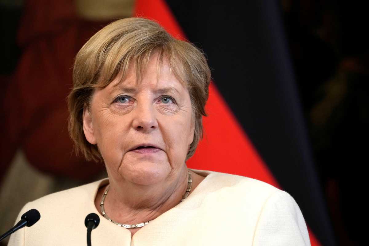 German Chancellor Angela Merkel talks during a joint news conference with Italian Prime Minister Mario Draghi (not pictured) in Rome, Italy, October 7, 2021. Andrew Medichini