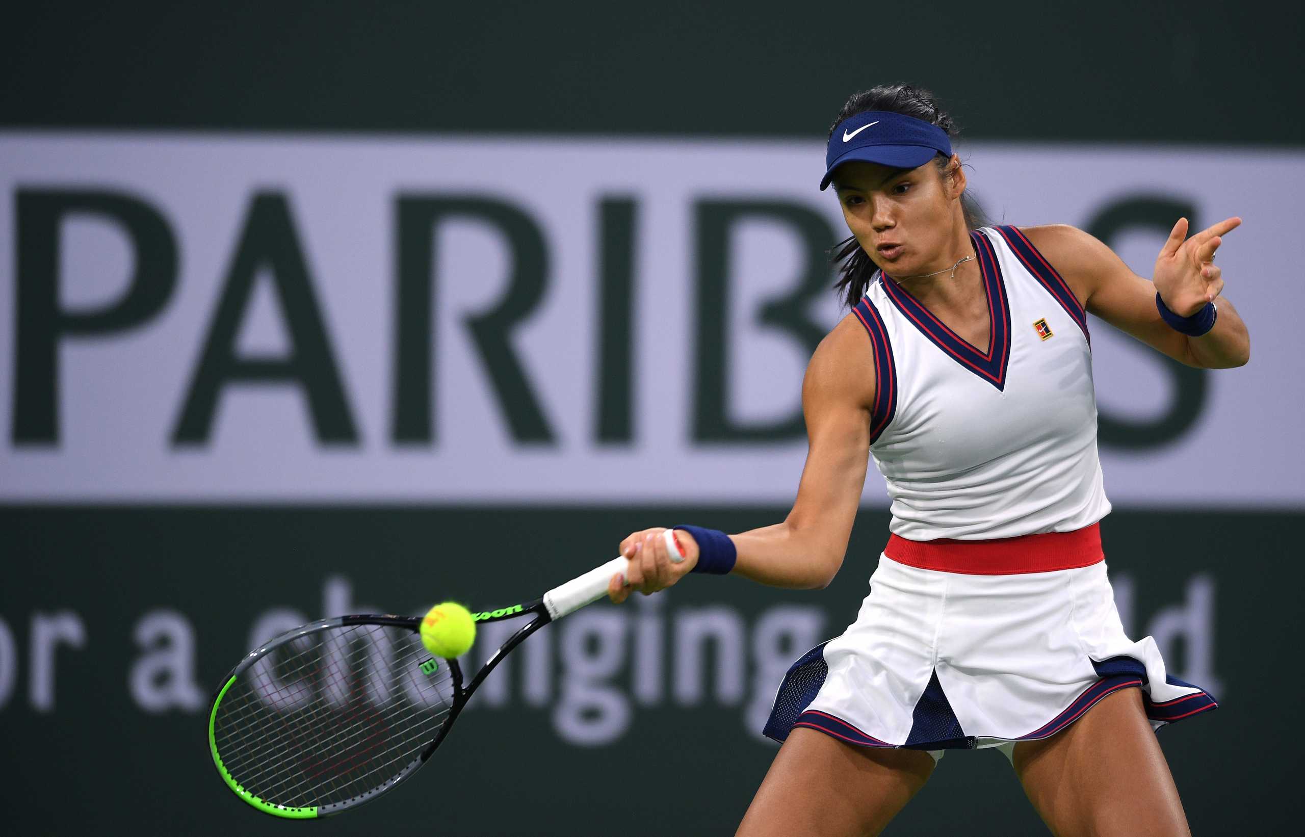 Oct 8, 2021; Indian Wells, CA, USA; Emma Raducanu (GBR) hits a shot against Aliaksandra Sasnovich (BLR) at Indian Wells Tennis Garden. Mandatory Credit: Orlando Ramirez-USA TODAY Sports