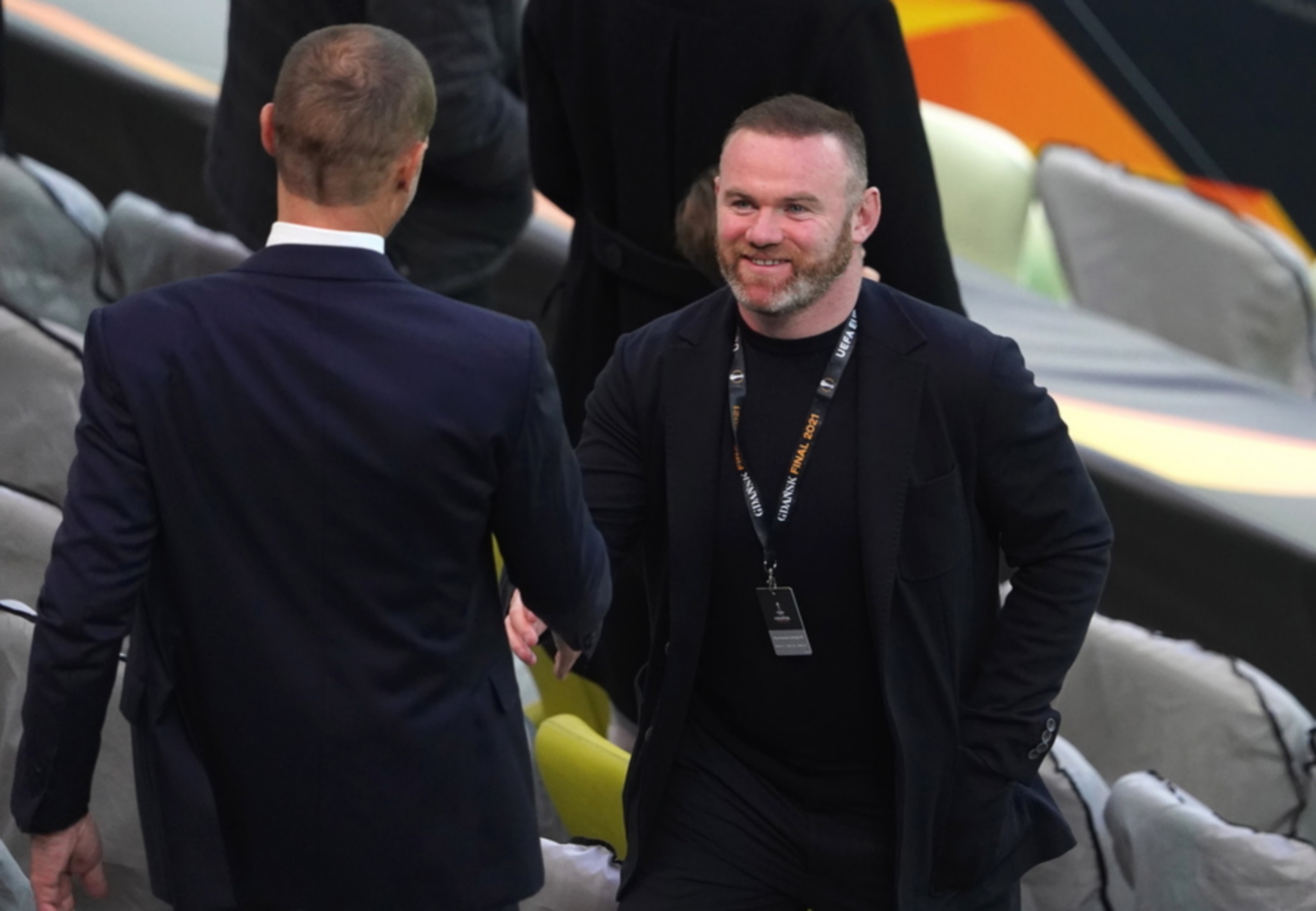 epa09229802 Derby County manager Wayne Rooney (R) attends the UEFA Europa League final soccer match between Villarreal CF and Manchester United in Gdansk, Poland, 26 May 2021.  EPA