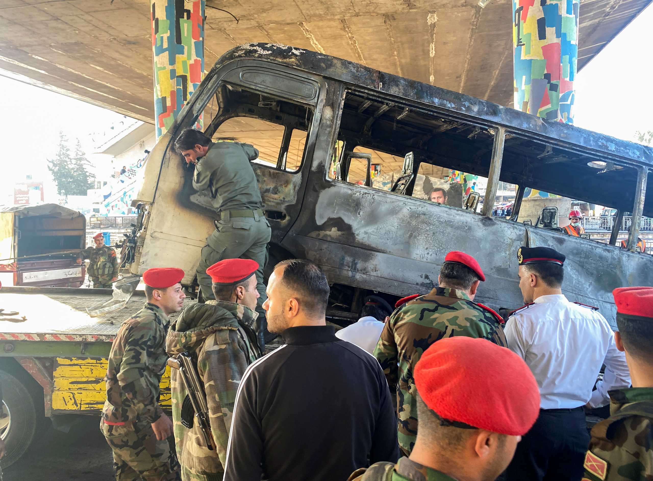 Military police inspect the site of an explosion in central Damascus, Syria October 20, 2021. REUTERS