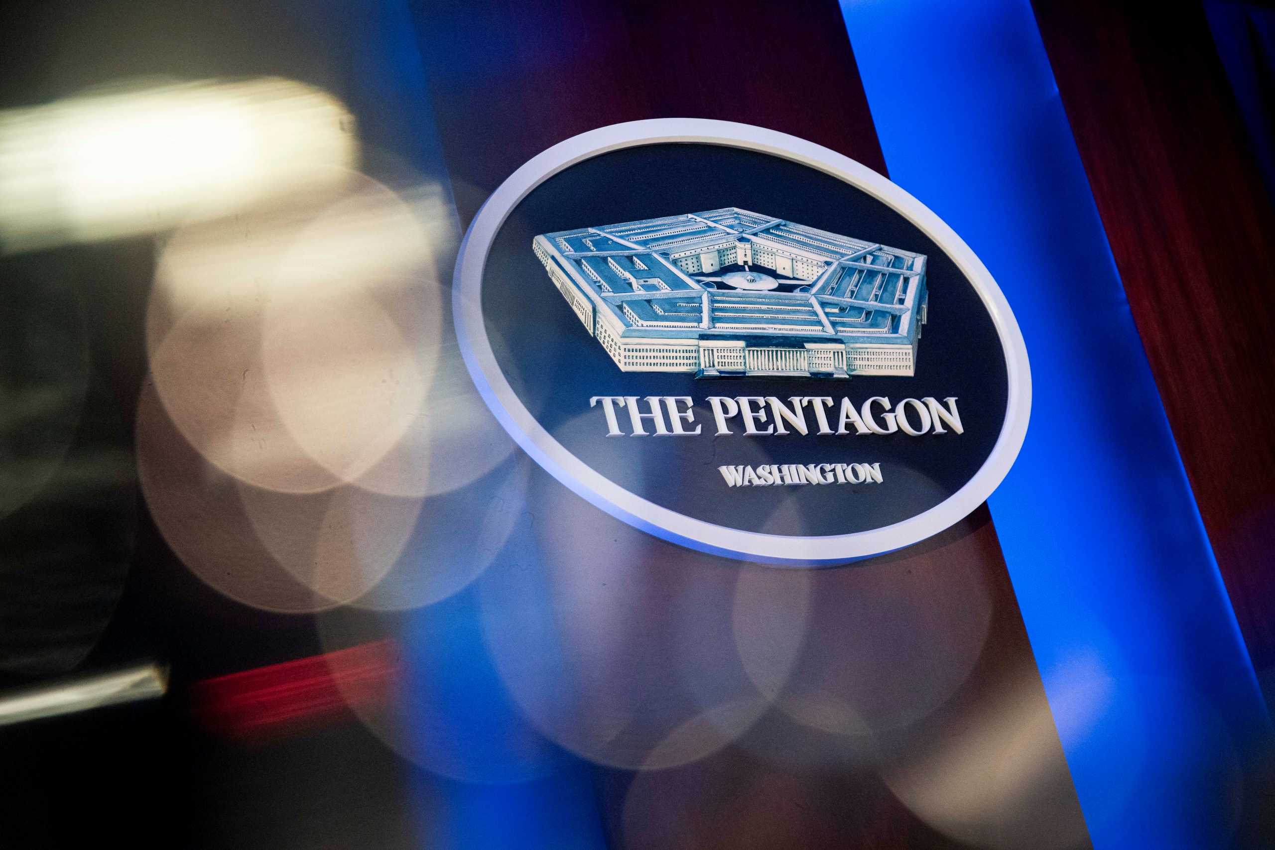 FILE PHOTO: The Pentagon logo is seen behind the podium in the briefing room at the Pentagon in Arlington, Virginia, U.S., January 8, 2020. REUTERS