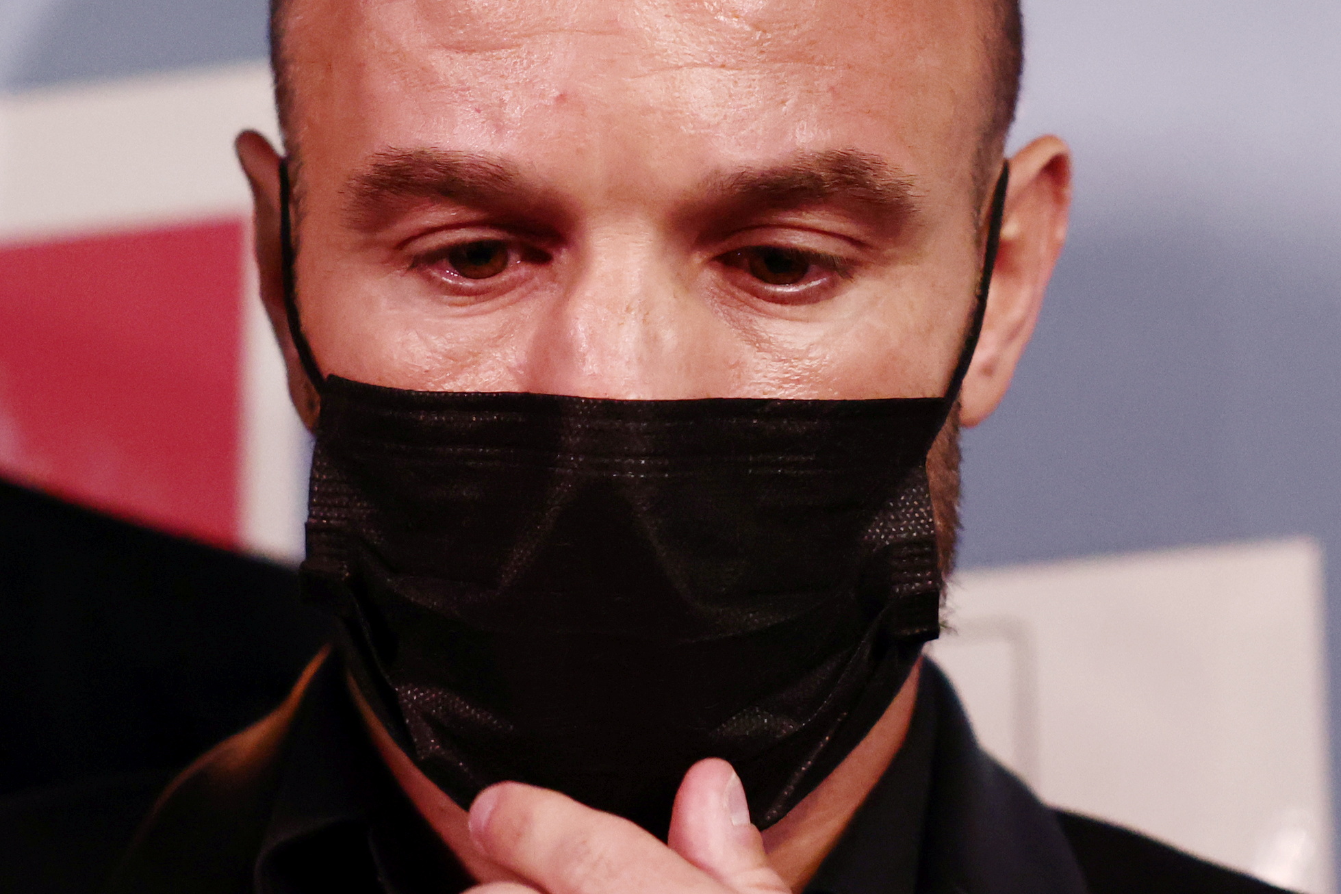French soccer player Mathieu Valbuena answers questions to journalists during a break in the trial of Real Madrid soccer team player Karim Benzema and other defendants, on charges of involvement in an alleged attempt to blackmail Valbuena over a sex tape almost five years ago, at the Versailles courthouse, near Paris, France, October 20, 2021. REUTERS