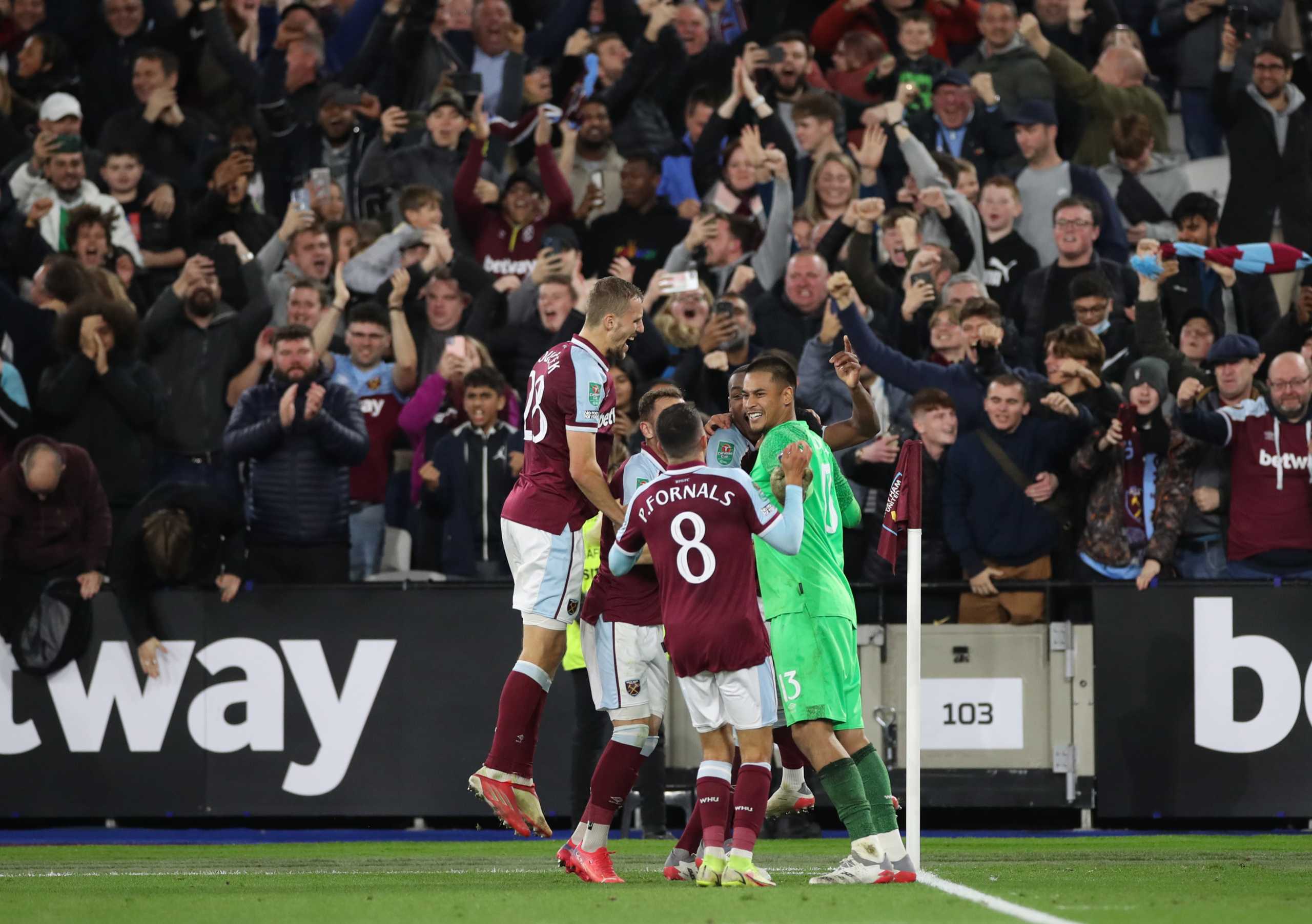 Soccer Football - Carabao Cup - Round of 16 - West Ham United v Manchester City - London Stadium, London, Britain - October 27, 2021 West Ham United's Said Benrahma celebrates with teammates after scoring the winning goal during the penalty shoot-out Action Images via Reuters