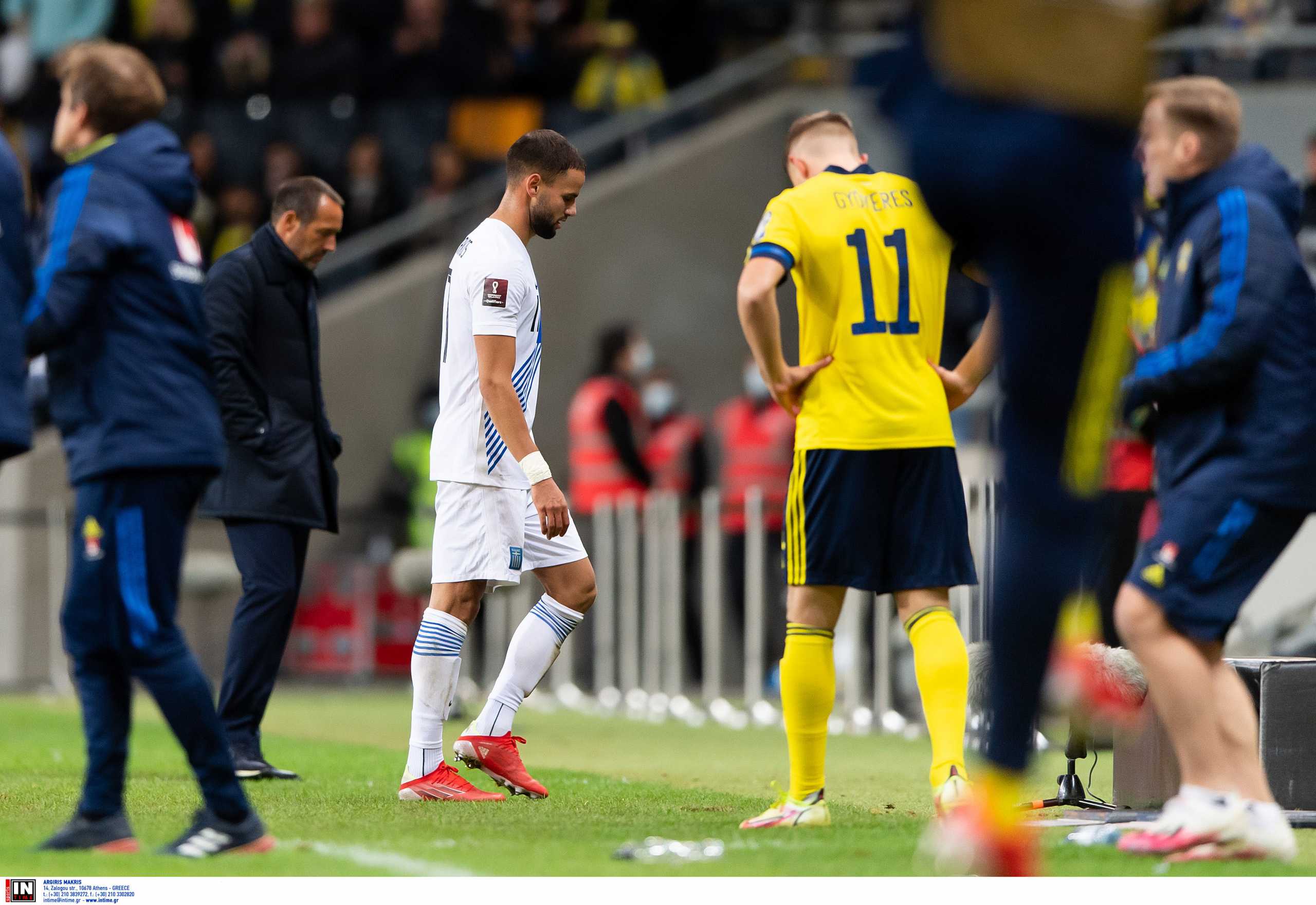 211012 Pantelis Hatzidiakos of Greece leaves the pitch after receiving his second yellow card during the FIFA World Cup Qualifier football match between Sweden and Greece on October 12, 2021 in Stockholm. .Photo: Jesper Zerman