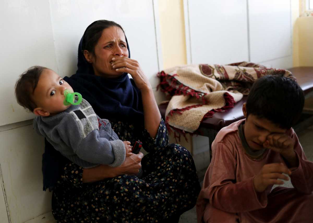 An Afghan woman reacts at the Indira Gandhi Children's hospital after explosions at a military hospital in Kabul, Afghanistan November 2, 2021. Indira Gandhi Children's hospital was not attacked. REUTERS