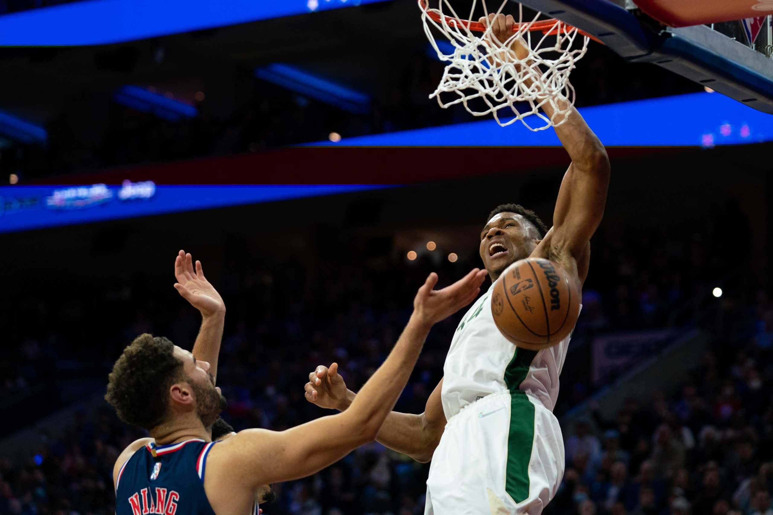 Nov 9, 2021; Philadelphia, Pennsylvania, USA; Milwaukee Bucks forward Giannis Antetokounmpo (34) dunks the ball in front of Philadelphia 76ers forward Georges Niang (20) during the fourth quarter at Wells Fargo Center. Mandatory Credit: Bill Streicher-USA TODAY Sports