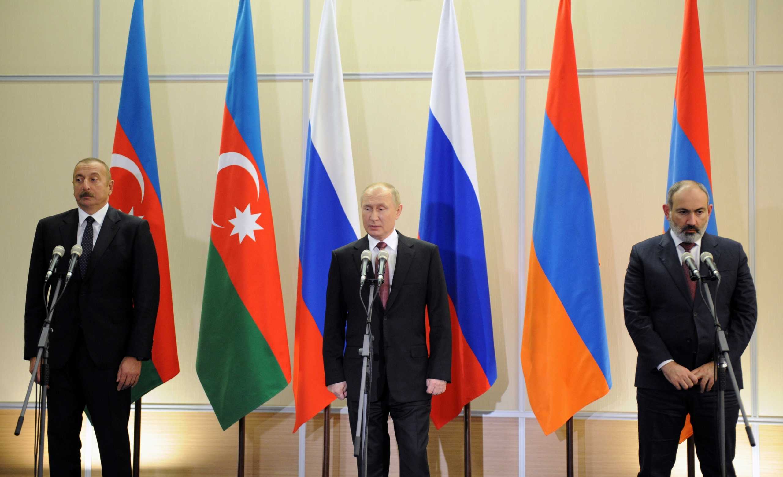 Russia's President Vladimir Putin, Armenia's Prime Minister Nikol Pashinyan and Azerbaijan's President Ilham Aliyev attend a news conference following their trilateral meeting in Sochi, Russia November 26, 2021. Sputnik