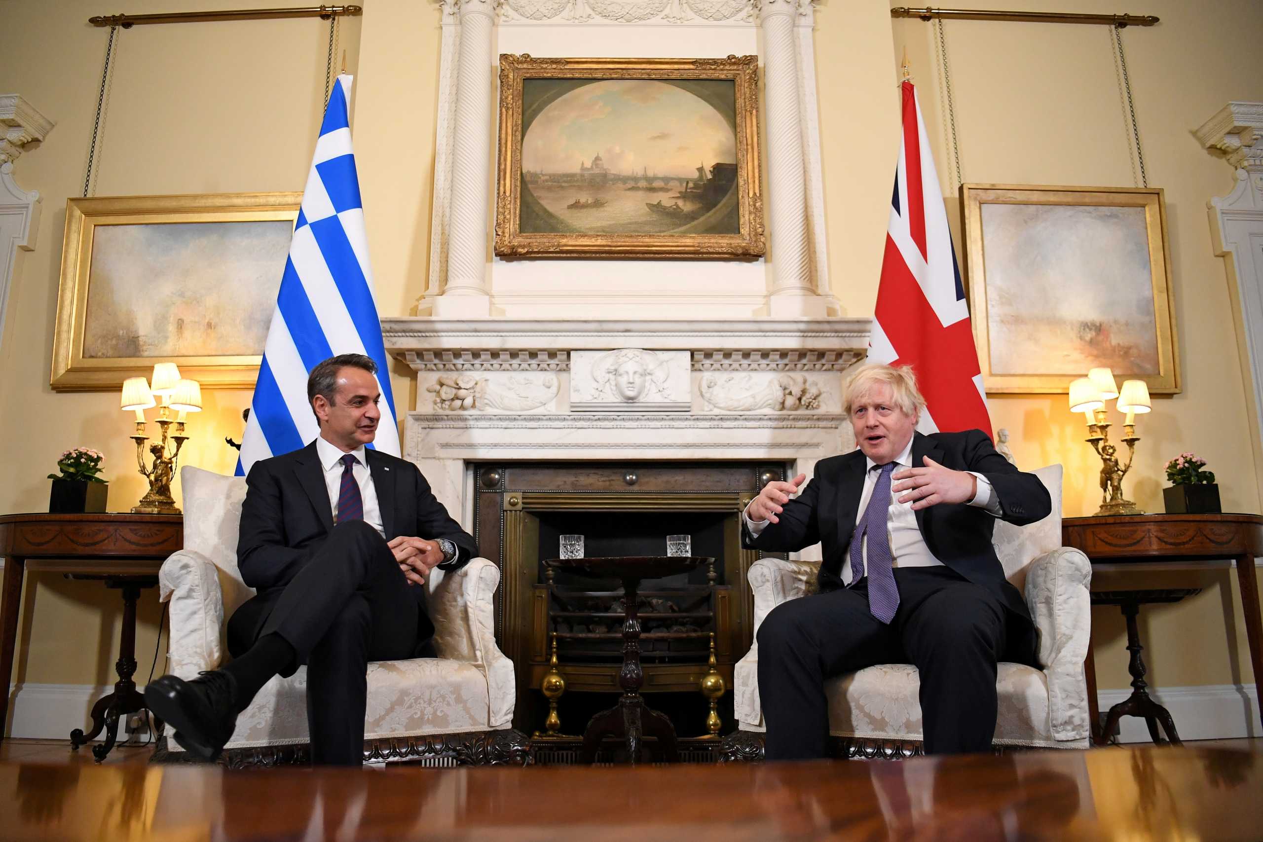 British Prime Minister Boris Johnson speaks with Greek Prime Minister Kyriakos Mitsotakis at Downing Street, in London, Britain, November 16, 2021.  Daniel Leal