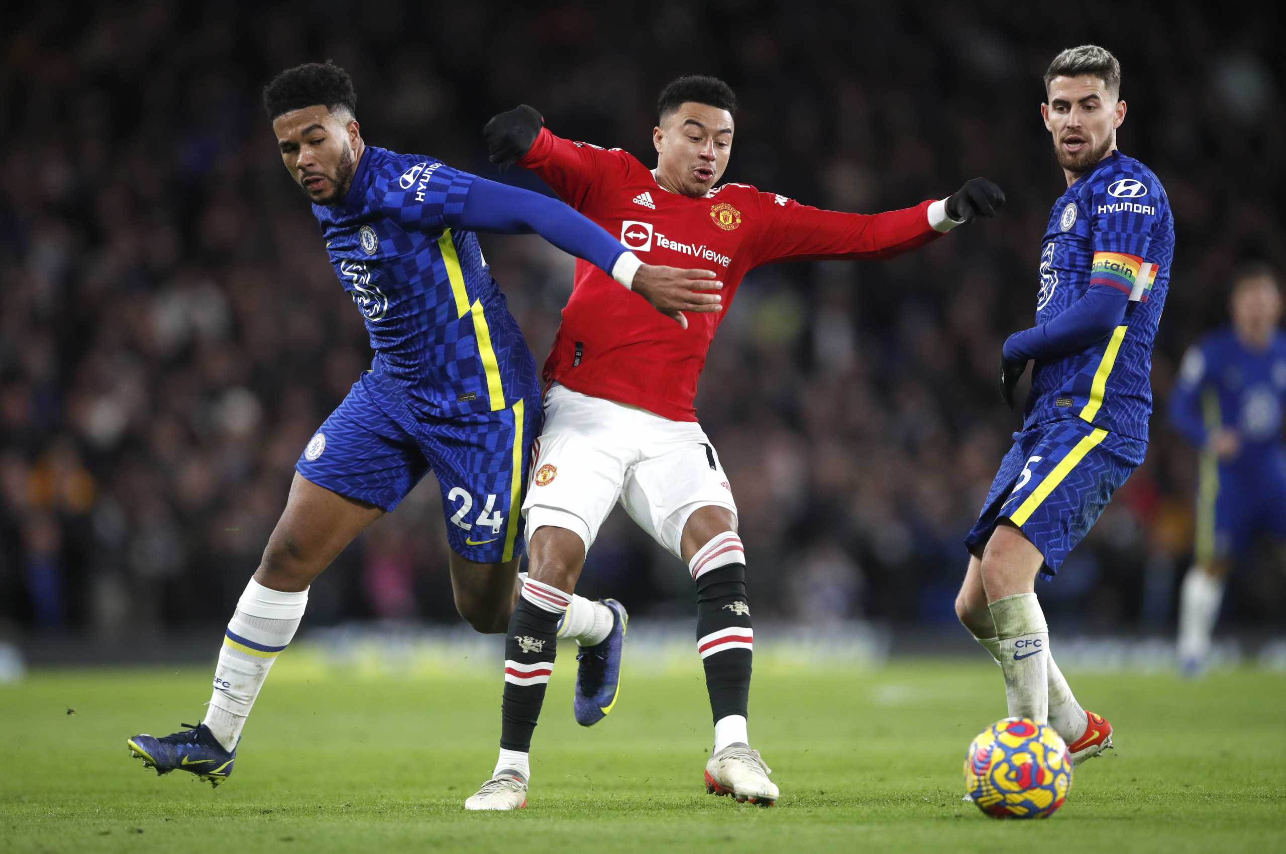 Soccer Football - Premier League - Chelsea v Manchester United - Stamford Bridge, London, Britain - November 28, 2021 Chelsea's Reece James and Jorginho in action with Manchester United's Jesse Lingard Action Images via Reuters