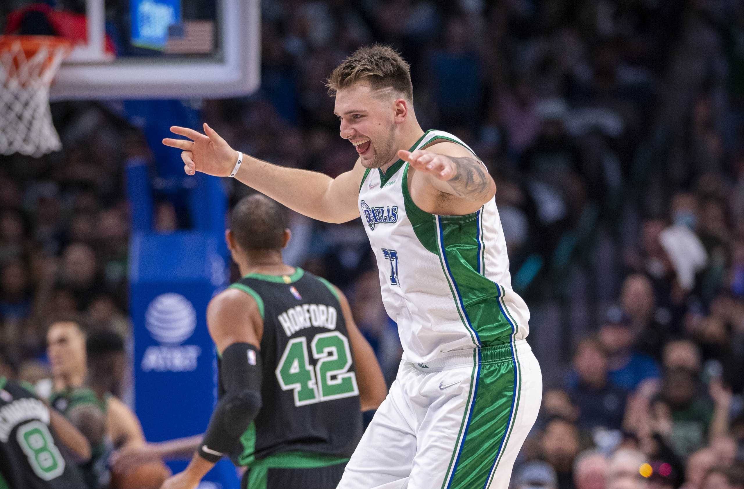 Nov 6, 2021; Dallas, Texas, USA; Dallas Mavericks guard Luka Doncic (77) celebrates making a three point shot against the Boston Celtics during the second quarter at the American Airlines Center. Mandatory Credit: Jerome Miron-USA TODAY Sports