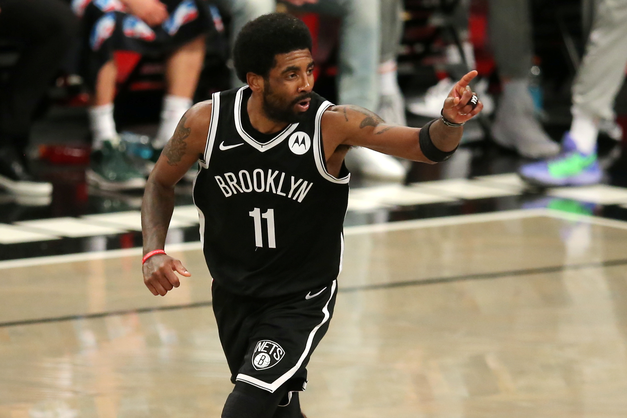 FILE PHOTO: Jun 5, 2021; Brooklyn, New York, USA; Brooklyn Nets point guard Kyrie Irving (11) reacts after making a basket against the Milwaukee Bucks during the second quarter of game one in the Eastern Conference semifinals of the 2021 NBA Playoffs at Barclays Center. Mandatory Credit: Brad Penner-USA TODAY Sports