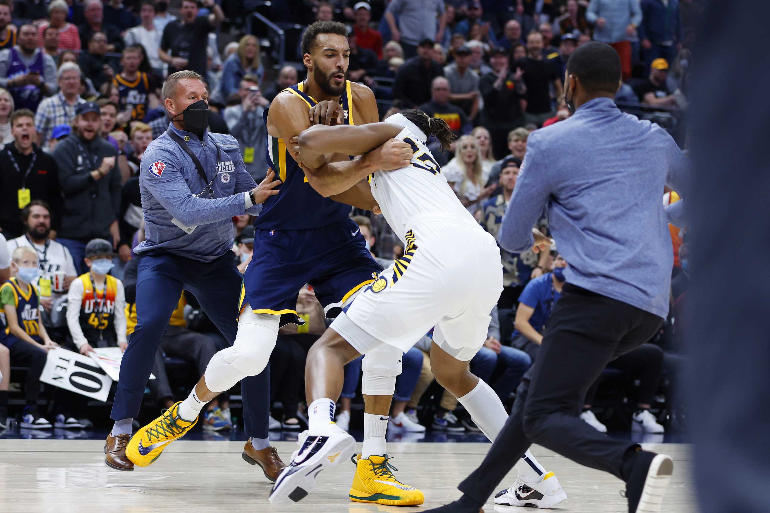 Nov 11, 2021; Salt Lake City, Utah, USA; Utah Jazz center Rudy Gobert (27) and Indiana Pacers center Myles Turner (33) get into a fight in the fourth quarter resulting in ejections for both players at Vivint Arena. Mandatory Credit: Jeffrey Swinger-USA TODAY Sports