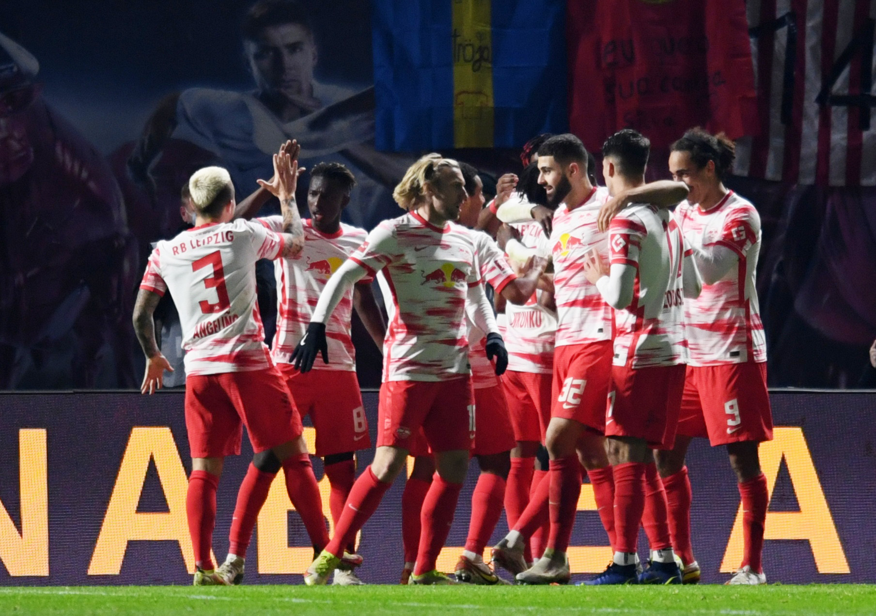 Soccer Football - Bundesliga - RB Leipzig v Borussia Dortmund - Red Bull Arena, Leipzig, Germany - November 6, 2021 RB Leipzig's Yussuf Poulsen celebrates scoring their second goal with teammates REUTERS