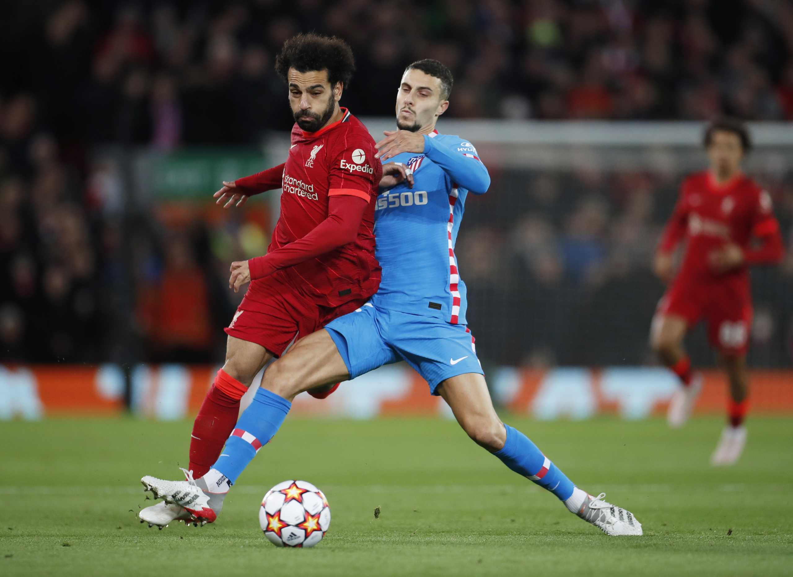 Soccer Football - Champions League - Group B - Liverpool v Atletico Madrid - Anfield, Liverpool, Britain - November 3, 2021 Liverpool's Mohamed Salah in action with Atletico Madrid's Mario Hermoso Action Images via Reuters