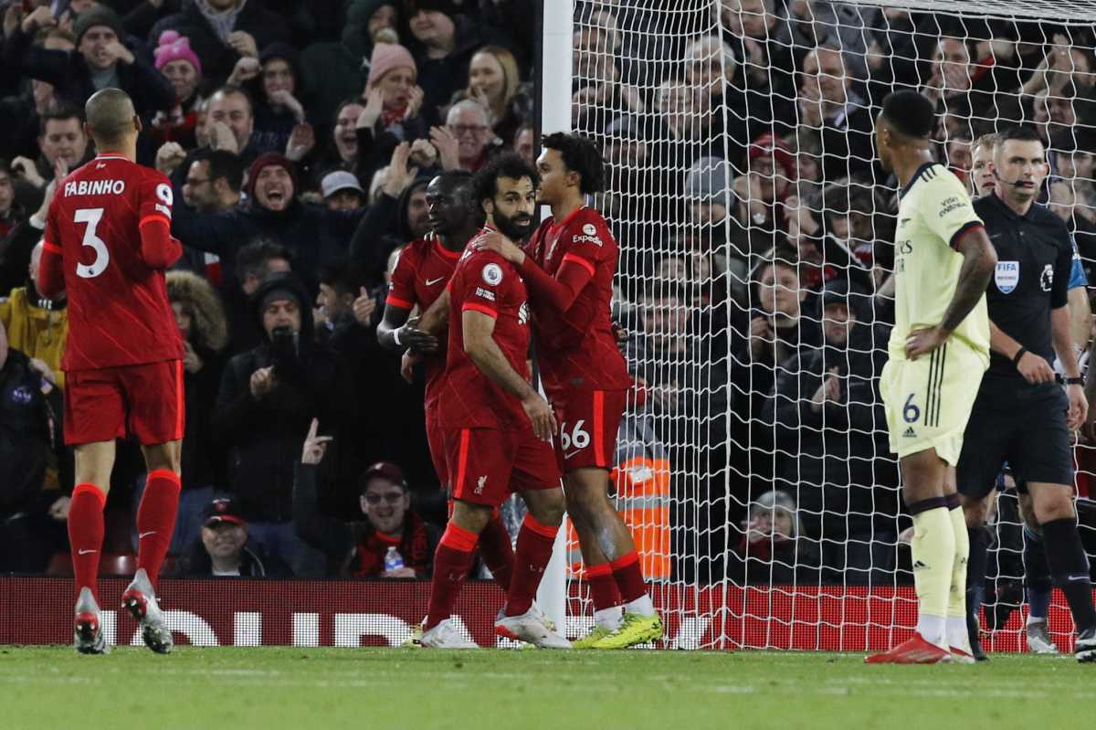 Soccer Football - Premier League - Liverpool v Arsenal - Anfield, Liverpool, Britain - November 20, 2021 Liverpool's Mohamed Salah celebrates scoring their third goal with Trent Alexander-Arnold and Sadio Mane Action Images via Reuters