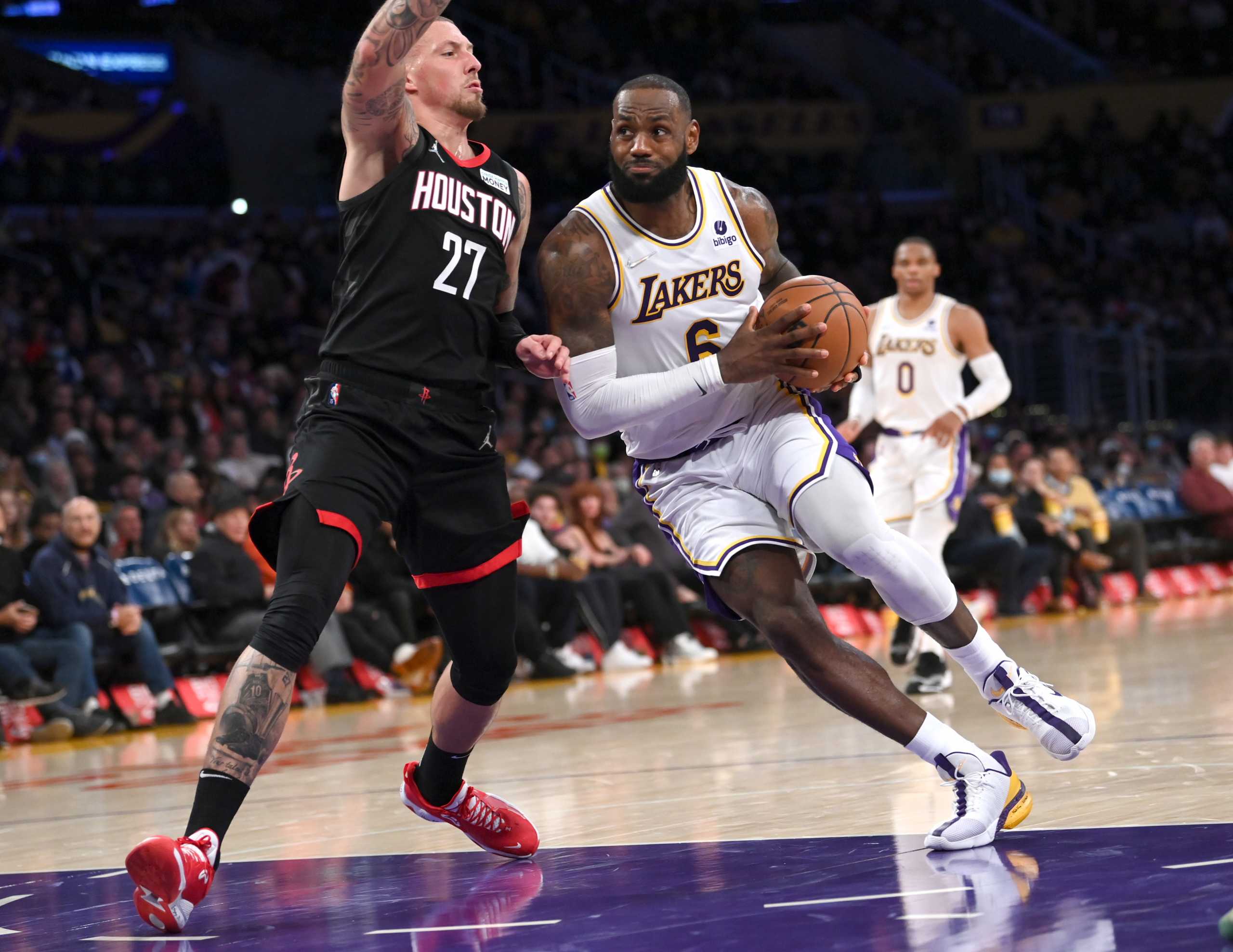 Oct 31, 2021; Los Angeles, California, USA;  Los Angeles Lakers forward LeBron James (6) drives to the basket past Houston Rockets center Daniel Theis (27) in the second half at Staples Center. Mandatory Credit: Jayne Kamin-Oncea-USA TODAY Sports