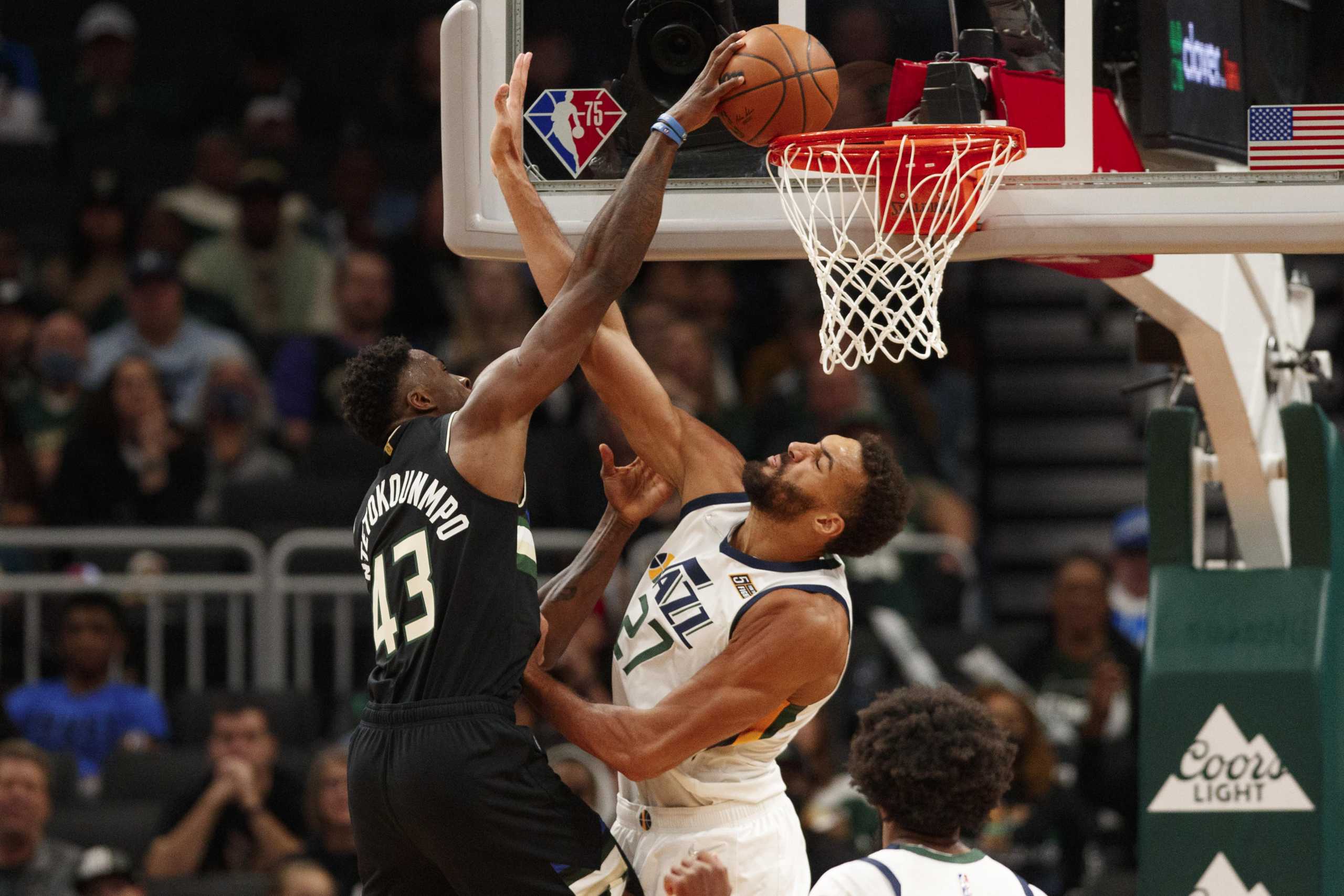 Oct 31, 2021; Milwaukee, Wisconsin, USA;  Milwaukee Bucks forward Thanasis Antetokounmpo (43) shoots against Utah Jazz center Rudy Gobert (27) during the third quarter at Fiserv Forum. Mandatory Credit: Jeff Hanisch-USA TODAY Sports