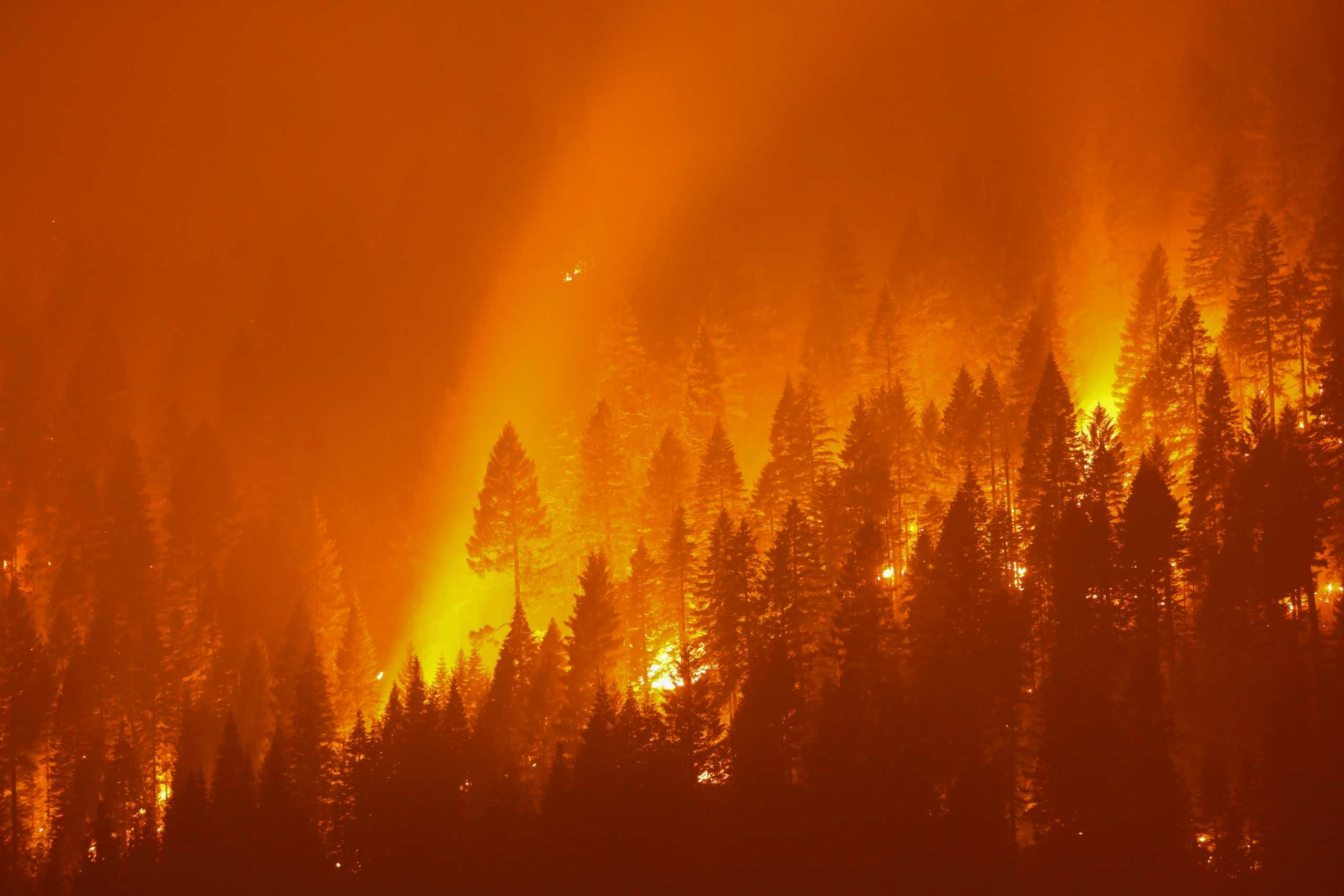 FILE PHOTO: The Dixie Fire ranked as the second-largest California wildfire on record - surpassed only by the million-acre-plus August Complex Fire of 2020.   REUTERS