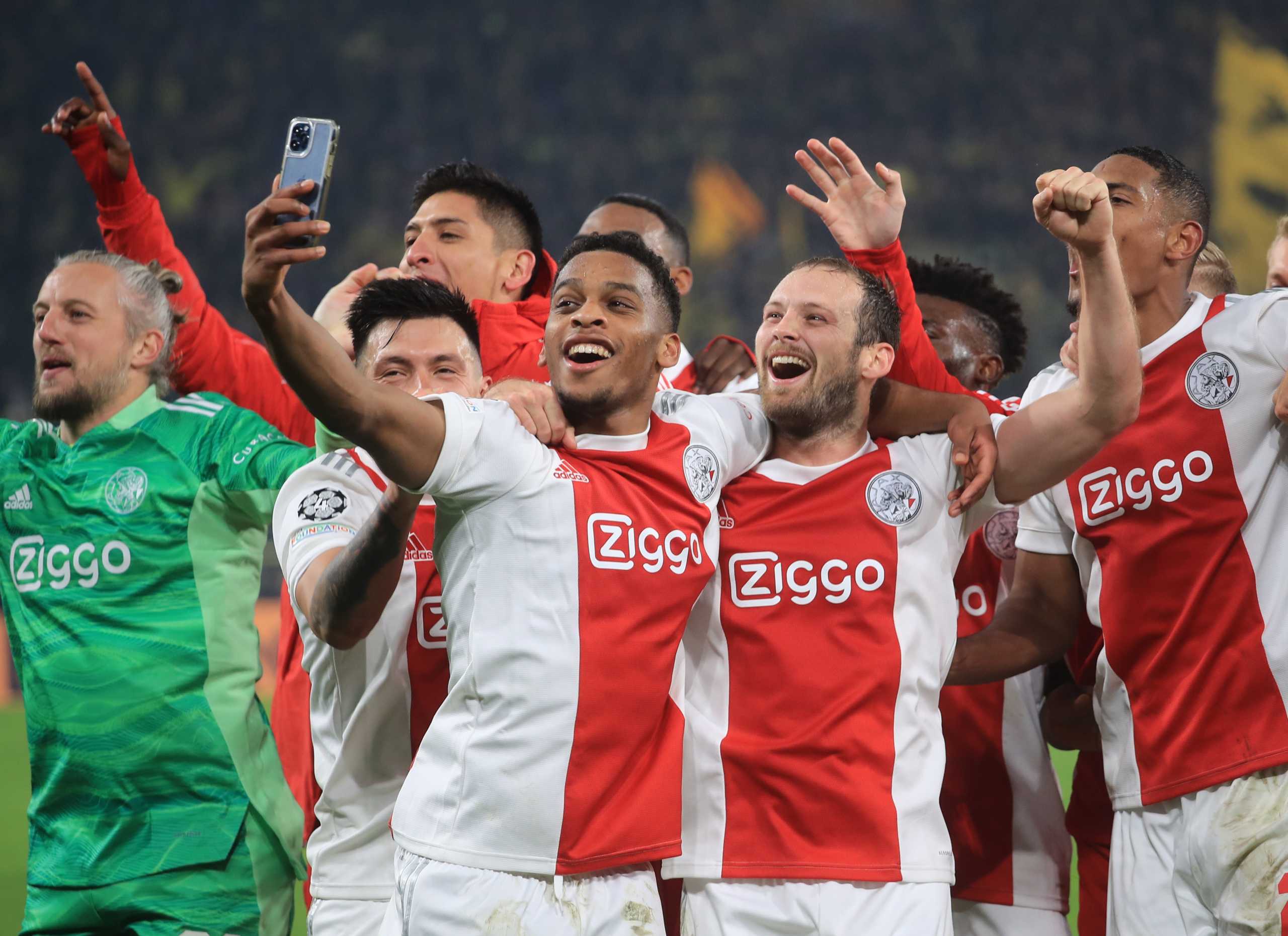 Soccer Football - Champions League - Group C - Borussia Dortmund v Ajax Amsterdam - Signal Iduna Park, Dortmund, Germany - November 3, 2021 Ajax Amsterdam players celebrate after the match REUTERS