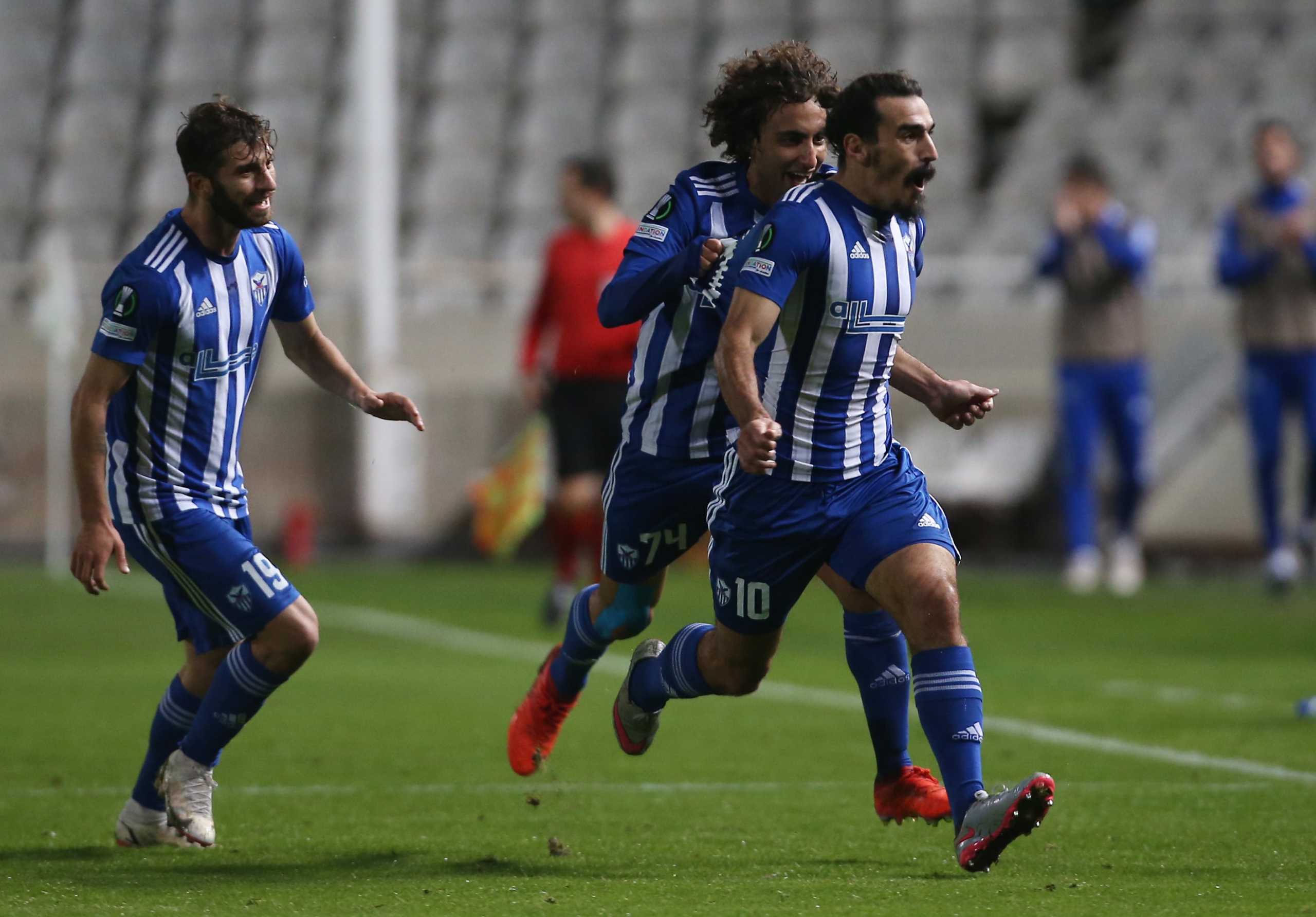 Soccer Football - Europa Conference League - Group B - Anorthosis v KAA Gent - GSP Stadium, Strovolos, Cyprus - November 25, 2021  Anorthosis' Lazaros Christodoulopoulos celebrates scoring their first goal with Amr Warda and Hovhannes Hambardzumyan REUTERS
