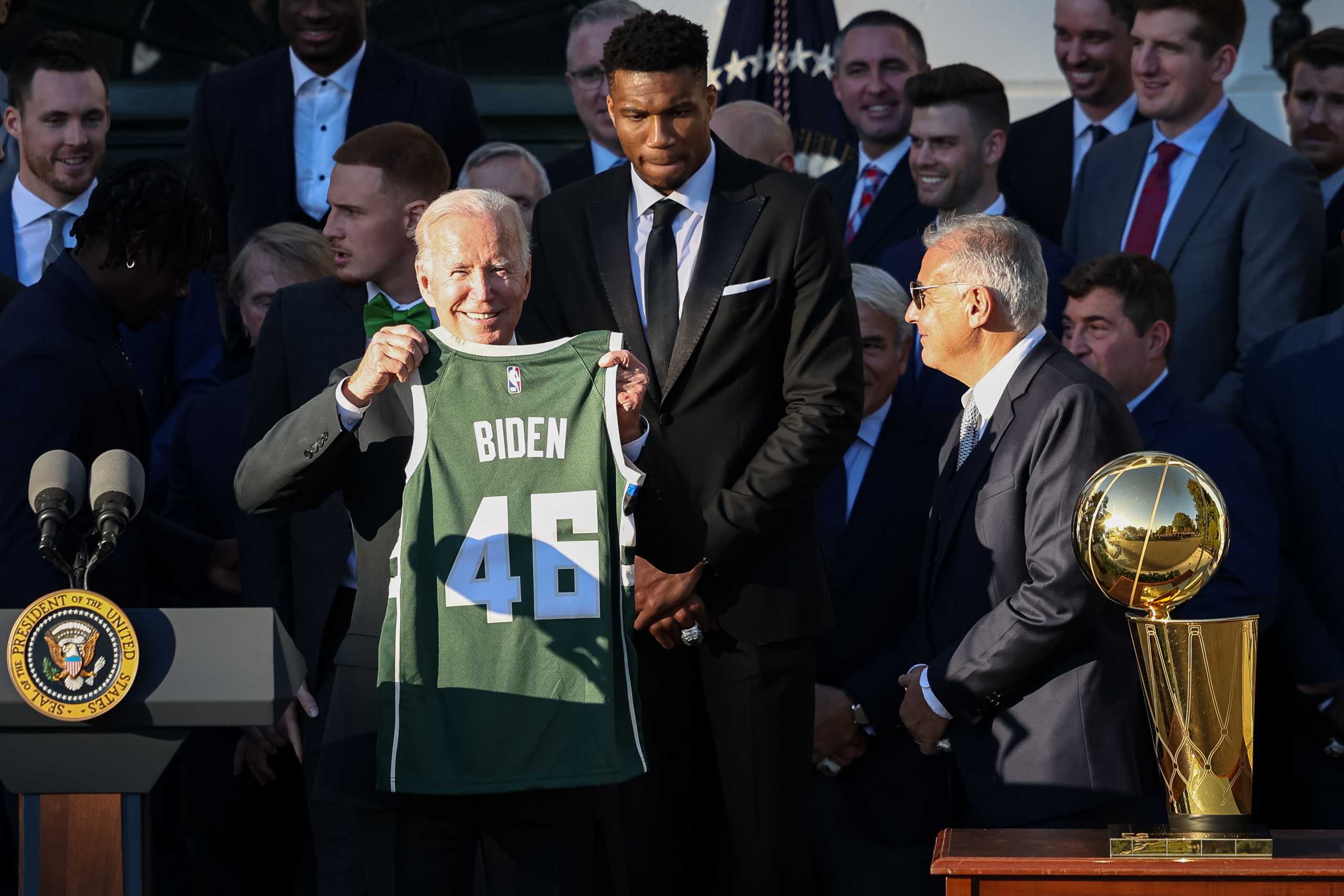 Nov 8, 2021; Washington, DC, USA;  U.S. President Joe Biden is presented with a jersey by Milwaukee Bucks player Giannis Antetokounmpo and owner Marc Lasry during a ceremony to honor the team for its NBA Championship on the South Lawn of the White House. Mandatory Credit: Scott Taetsch-USA TODAY Sports