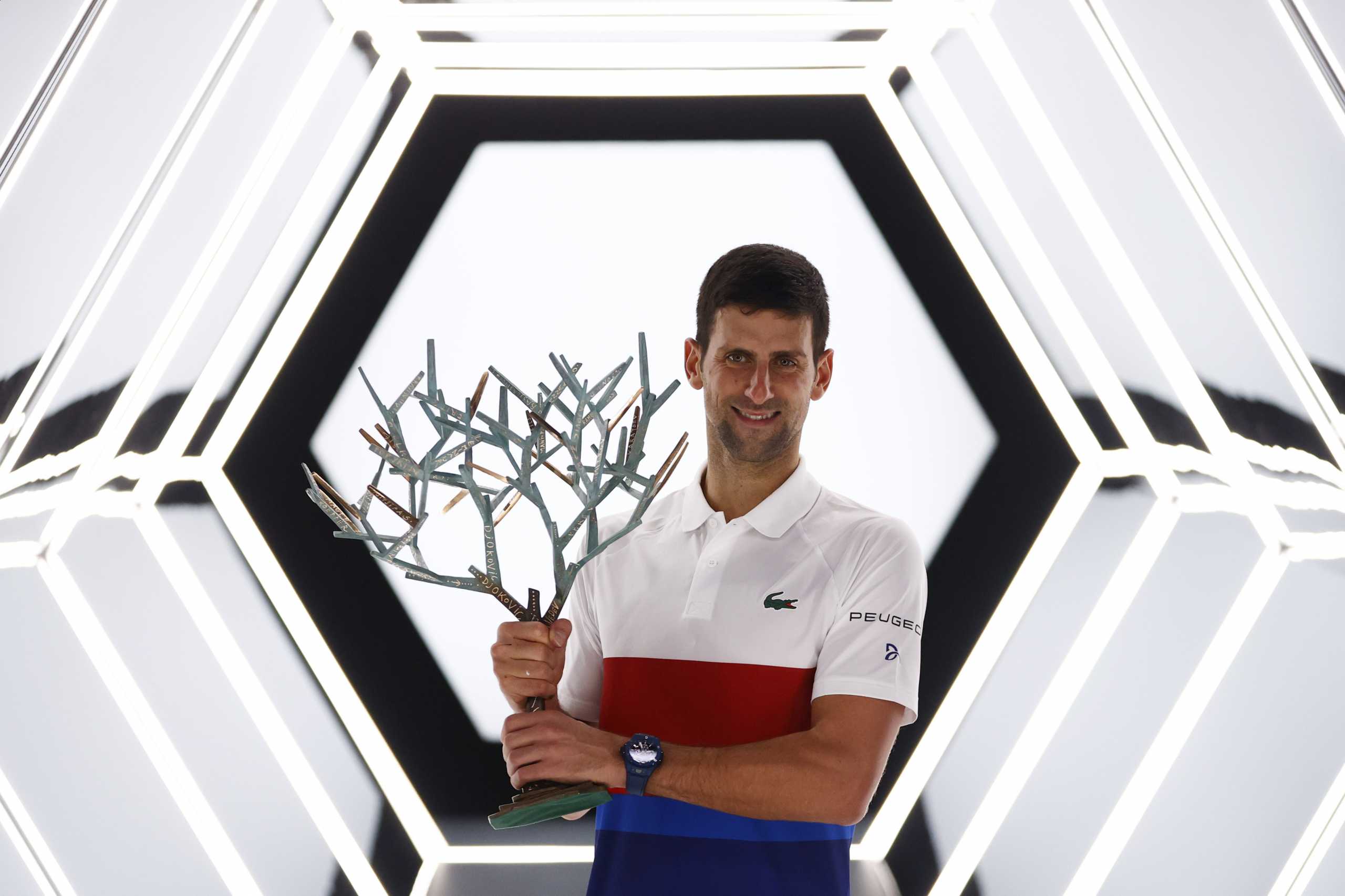 Tennis - ATP Masters 1000 - Paris Masters - Accor Arena, Paris, France - November 7, 2021 Serbia's Novak Djokovic holds the trophy and celebrates winning his final match against Russia's Daniil Medvedev REUTERS